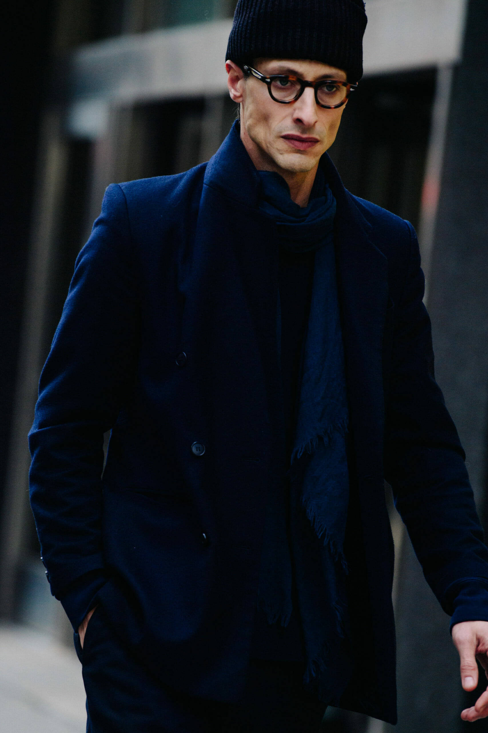 Man wearing blue coat