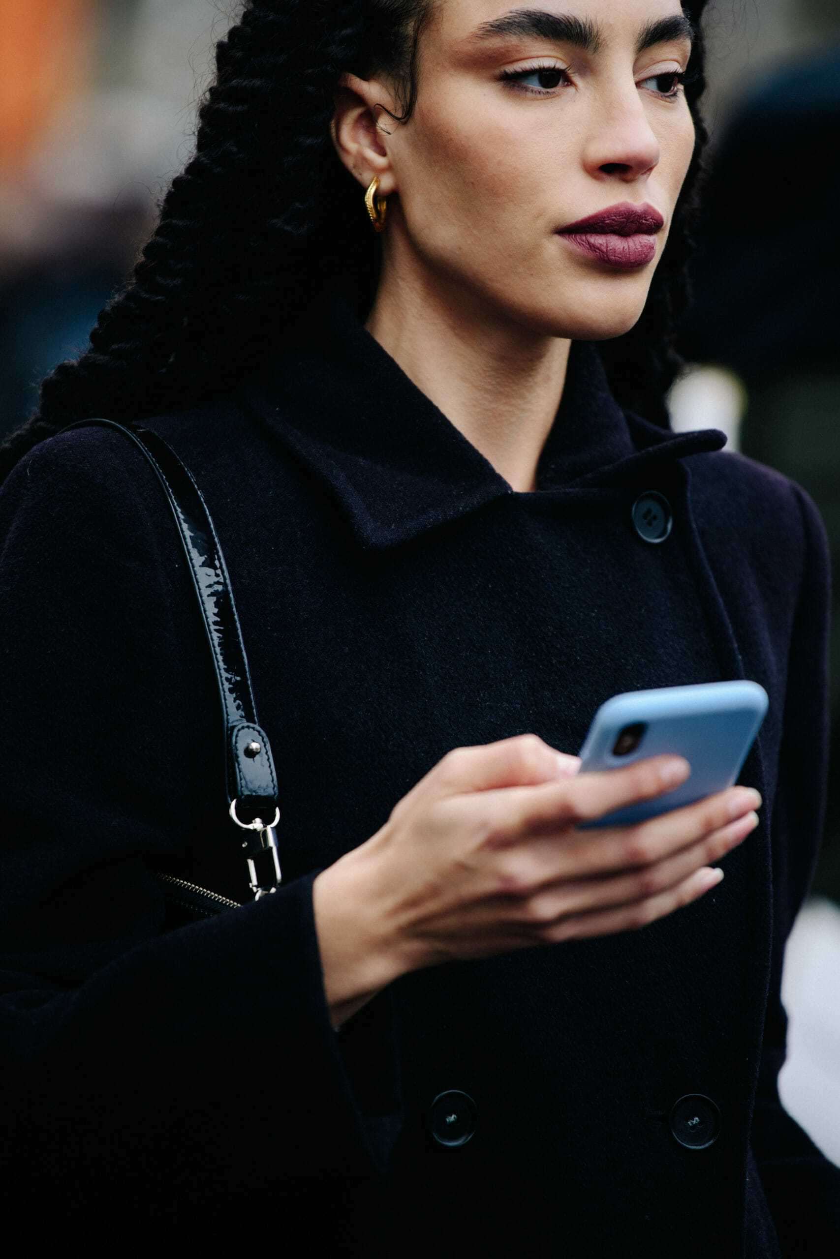 Woman wearing dark wool coat