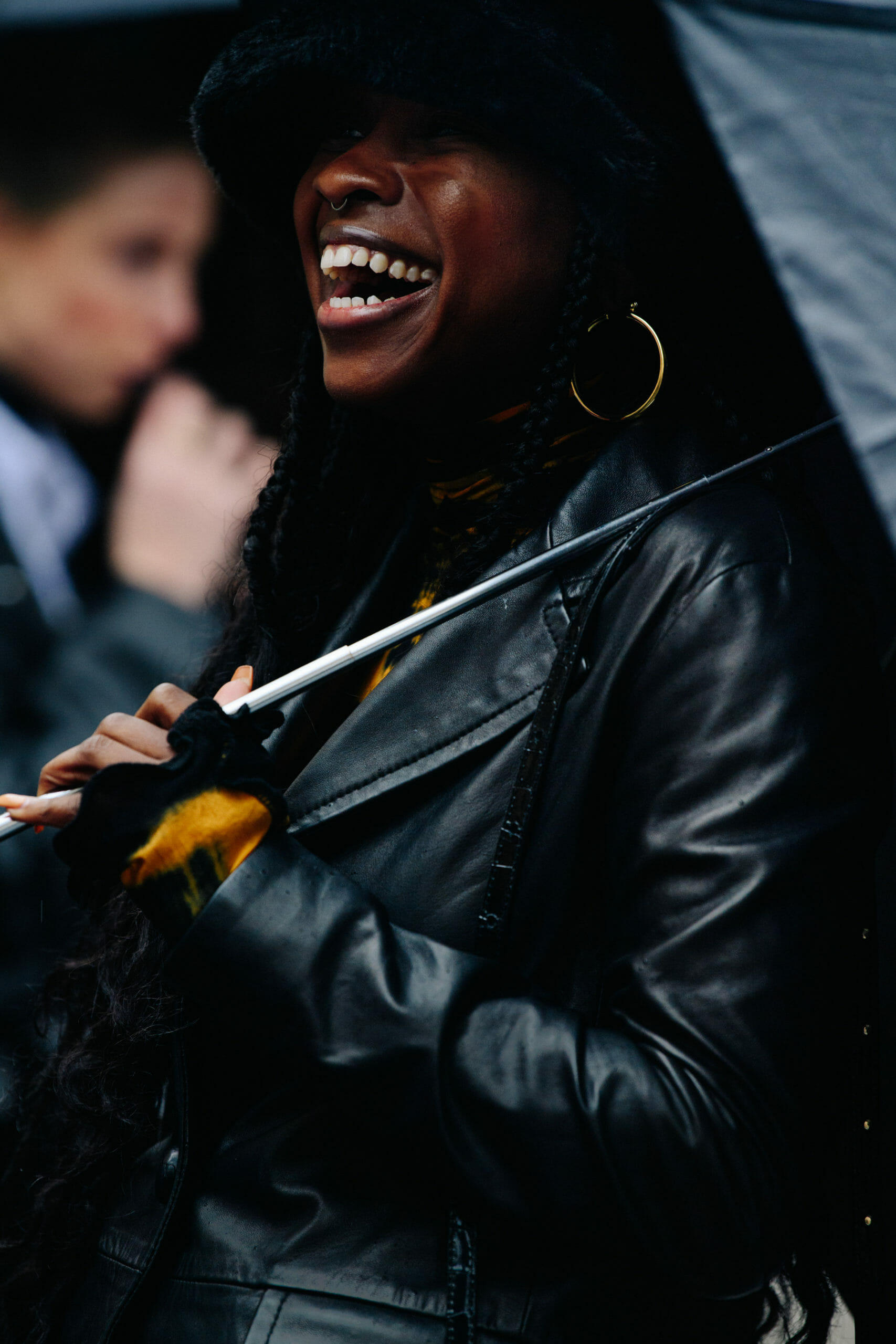 Woman carrying umbrella