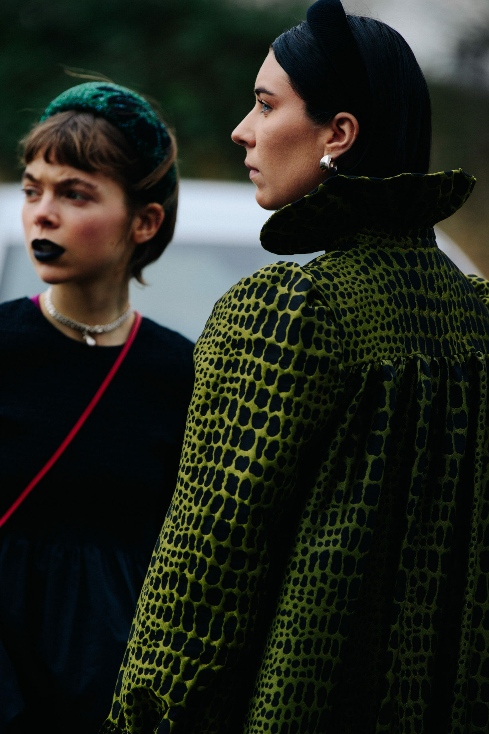 Two women wearing hairbands