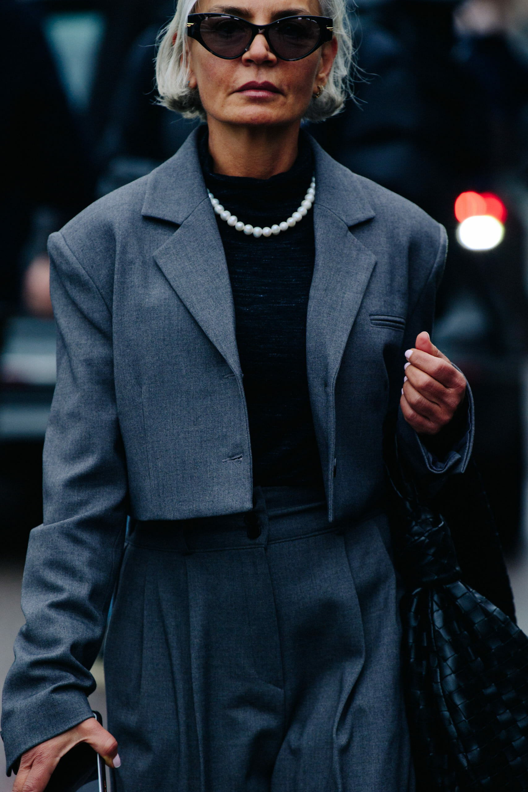 Woman wearing grey suit