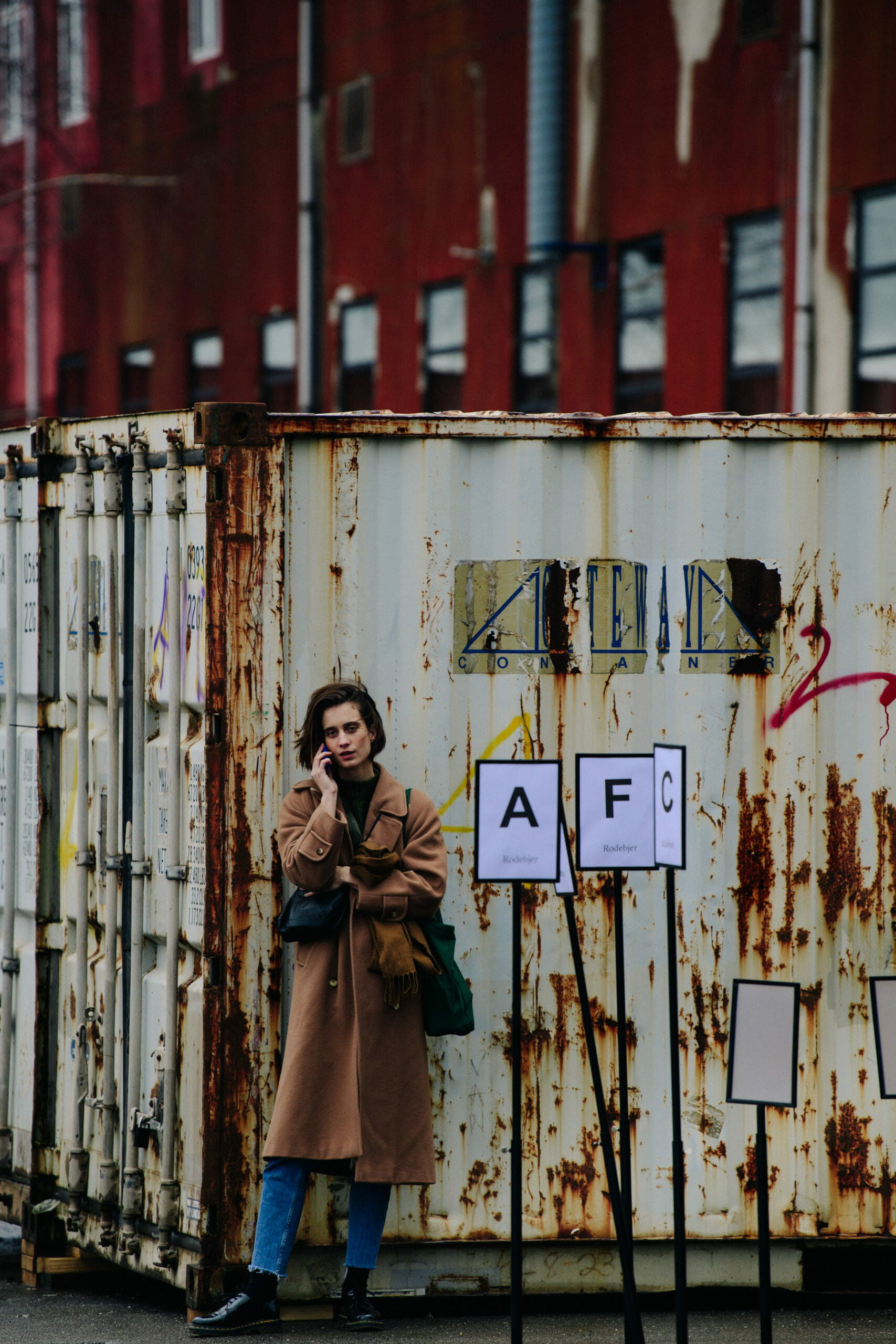 Model wearing brown coat