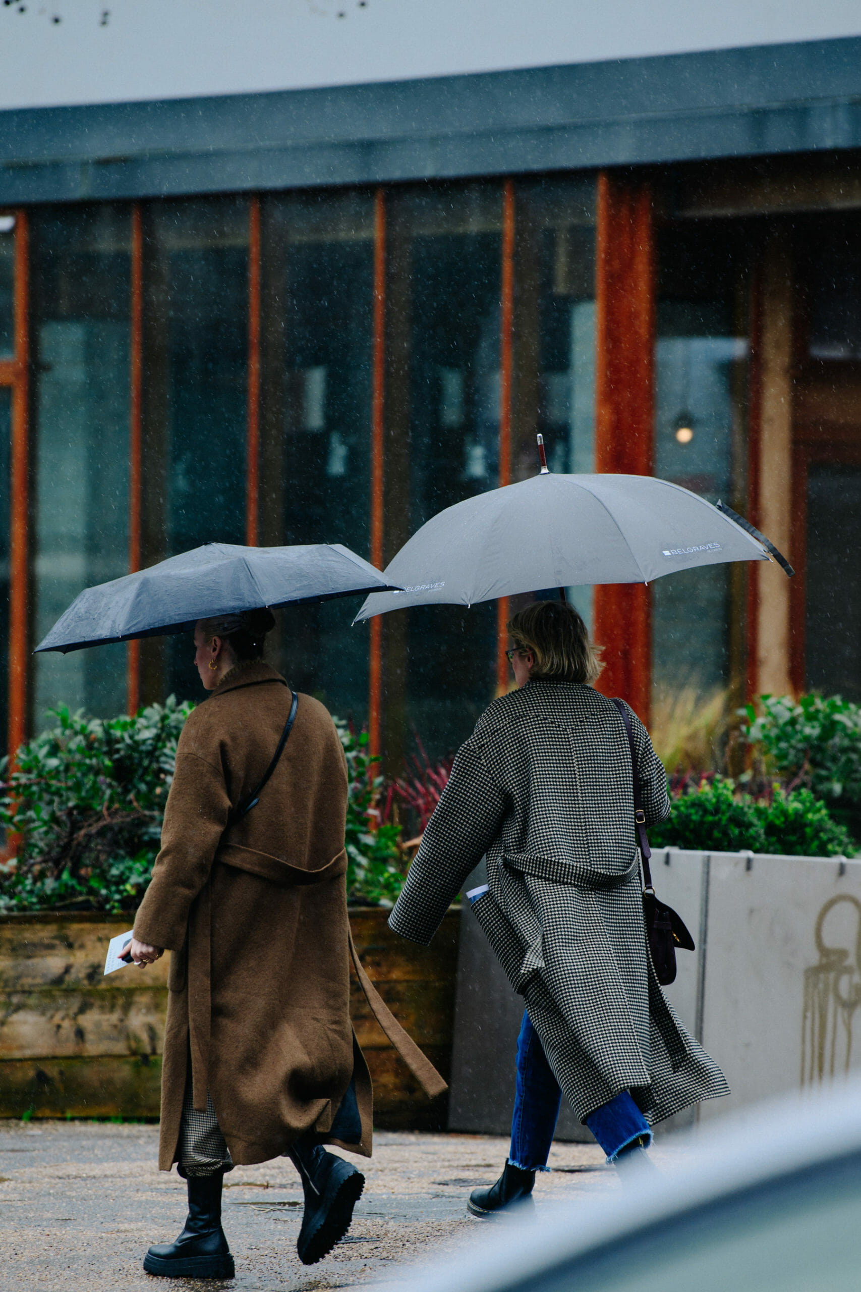 Two women wearing winter coats