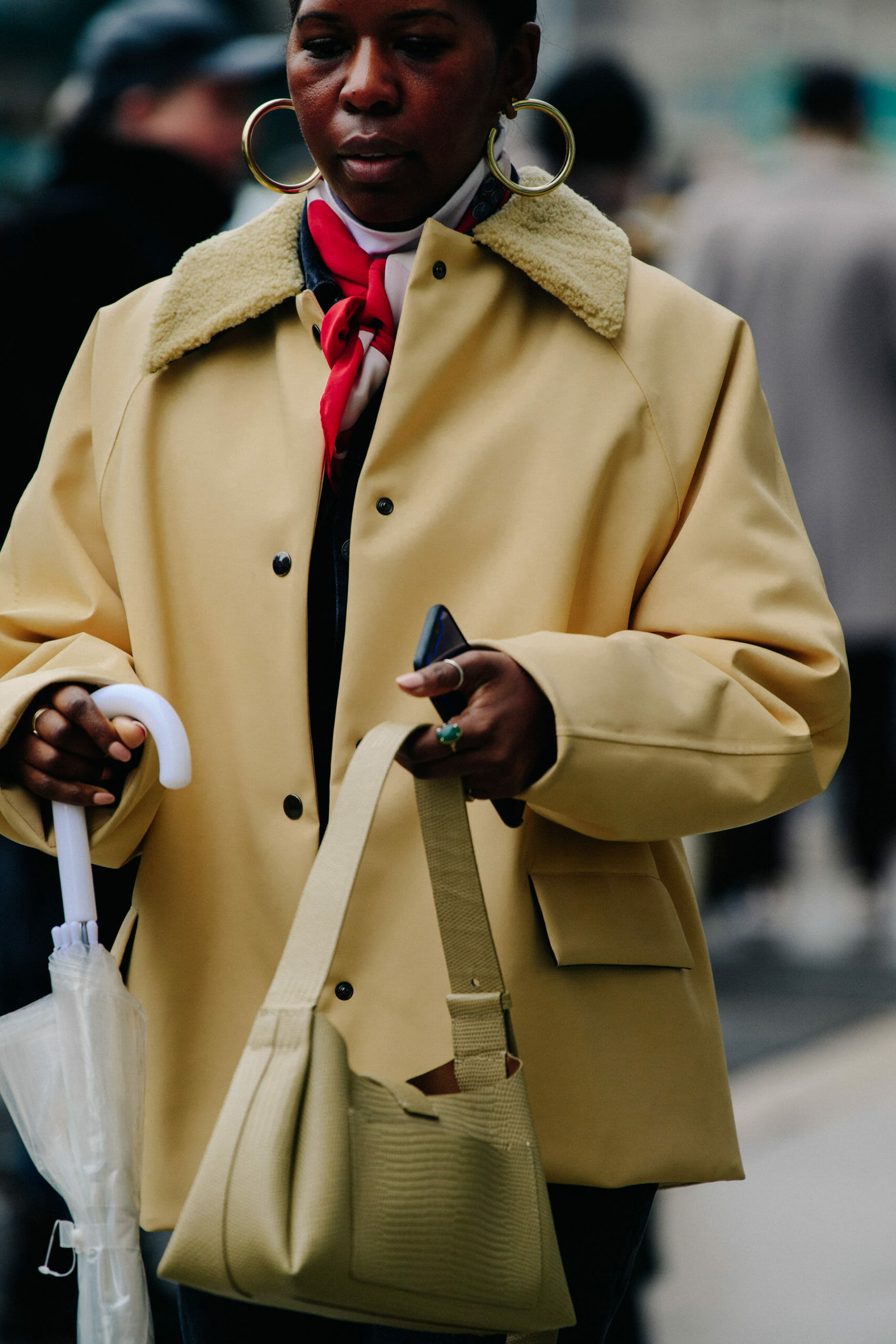 Woman wearing yellow jacket