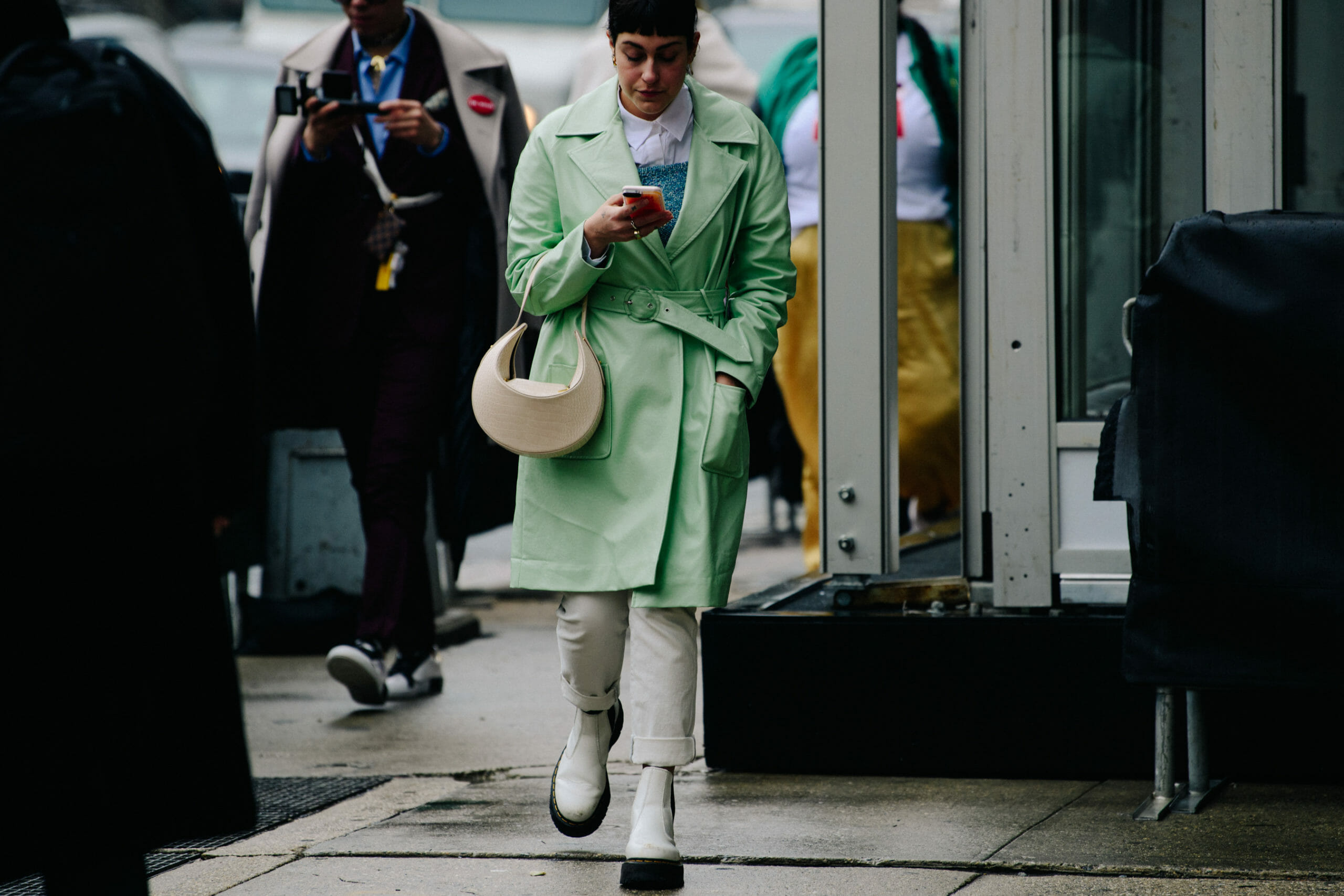 Woman wearing green jacket