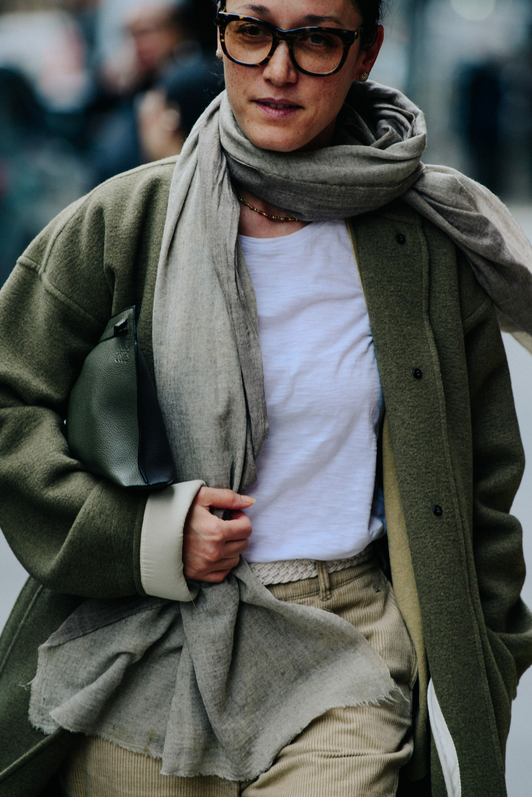 Woman wearing green jacket