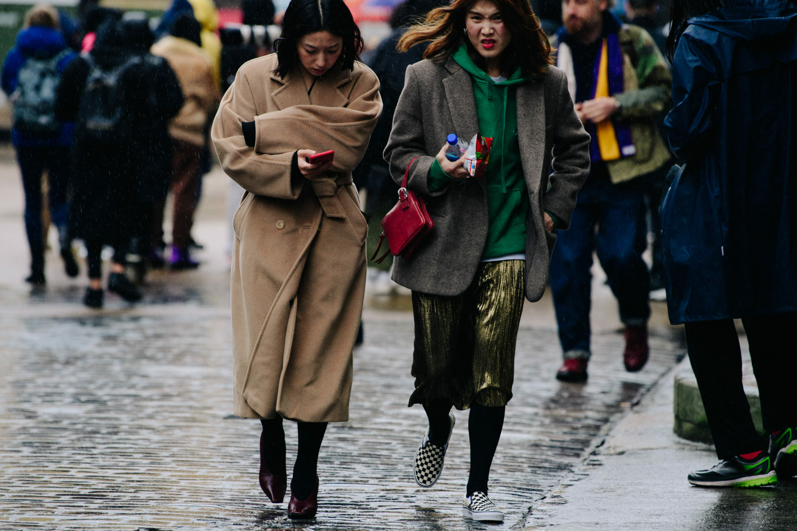 Two women wearing wool coats