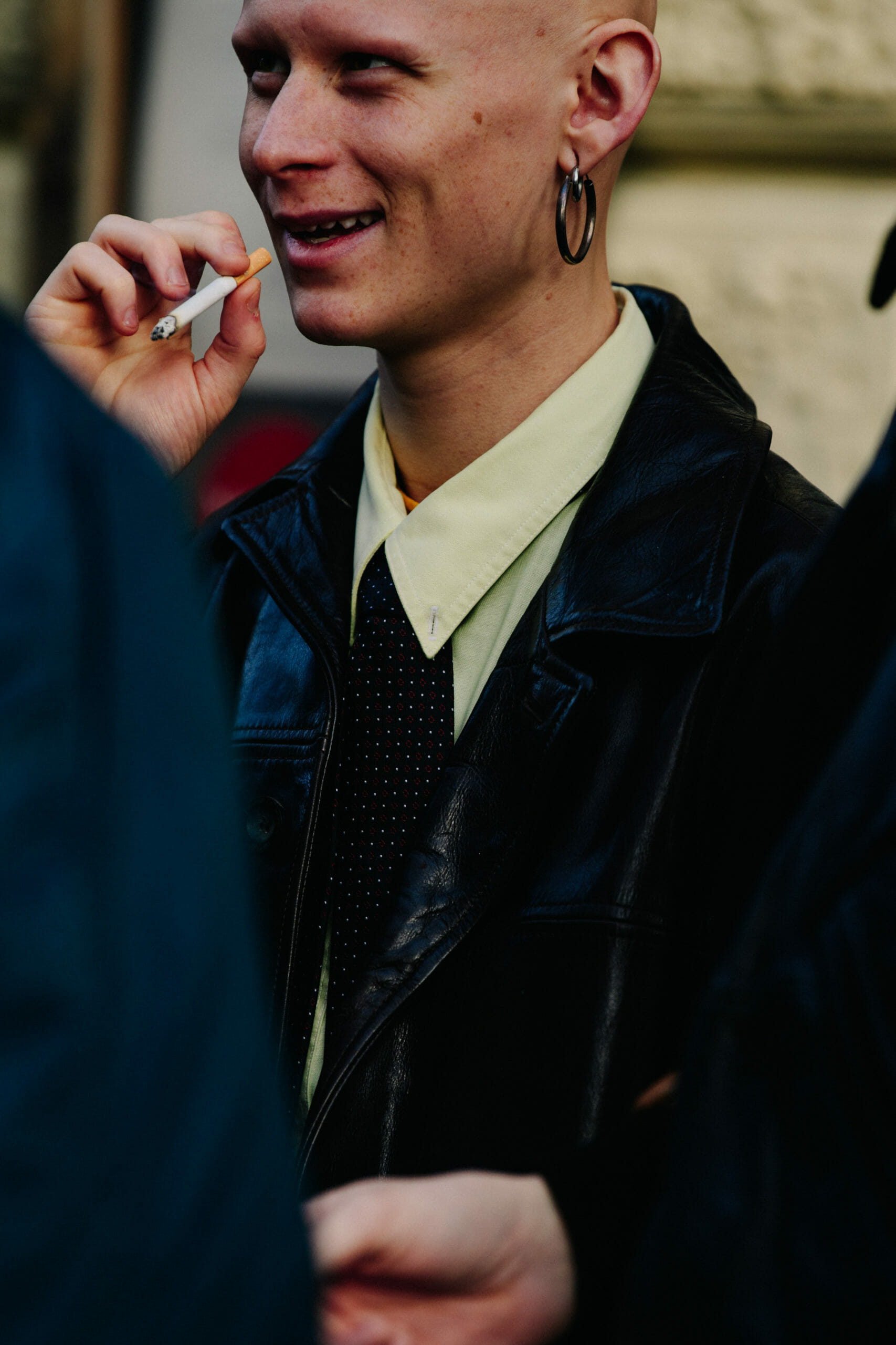 Man wearing hoop earring