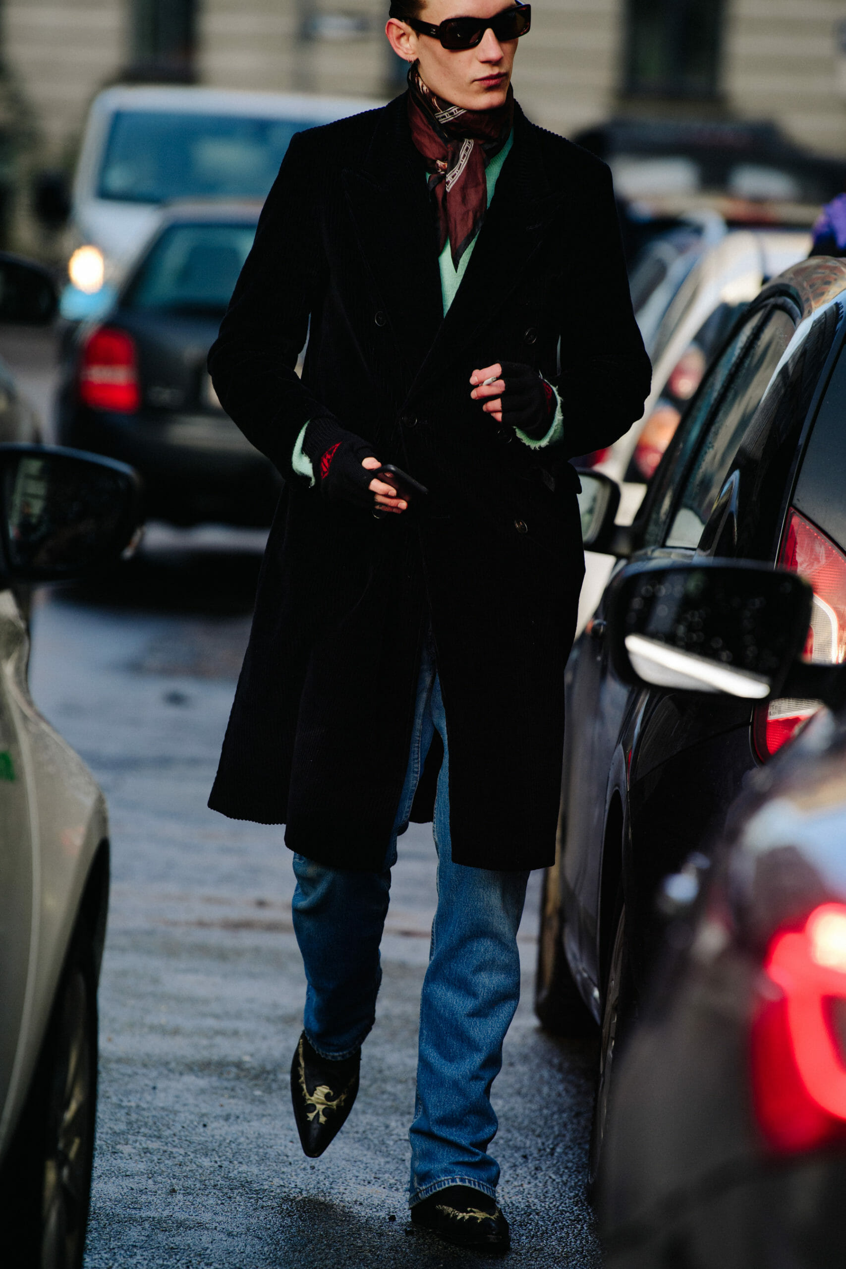 Model wearing black coat