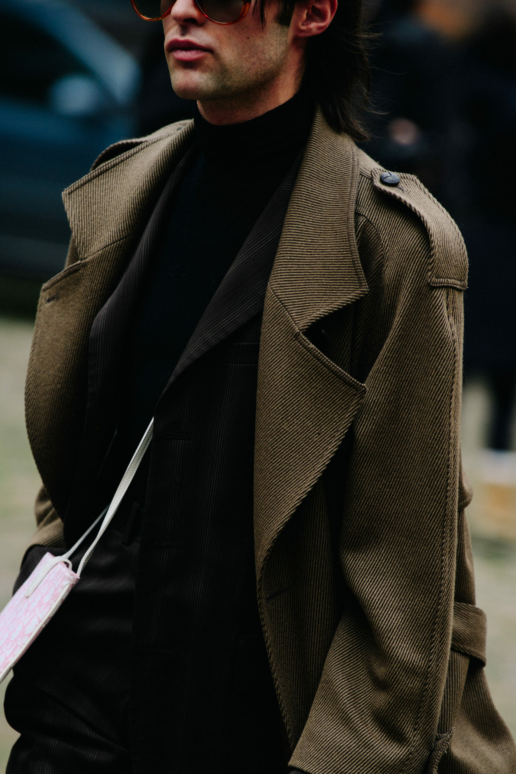 Man wearing brown coat