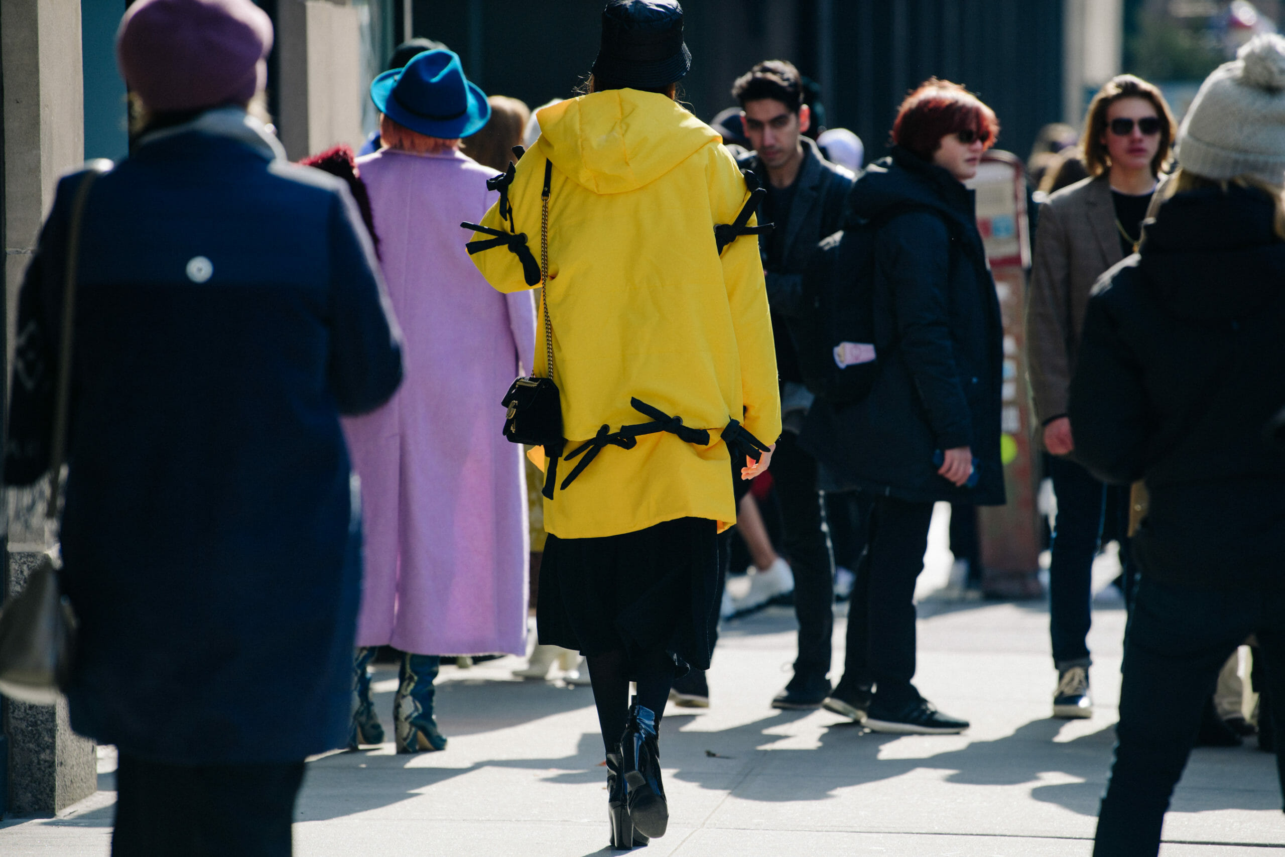 Woman wearing yellow coat