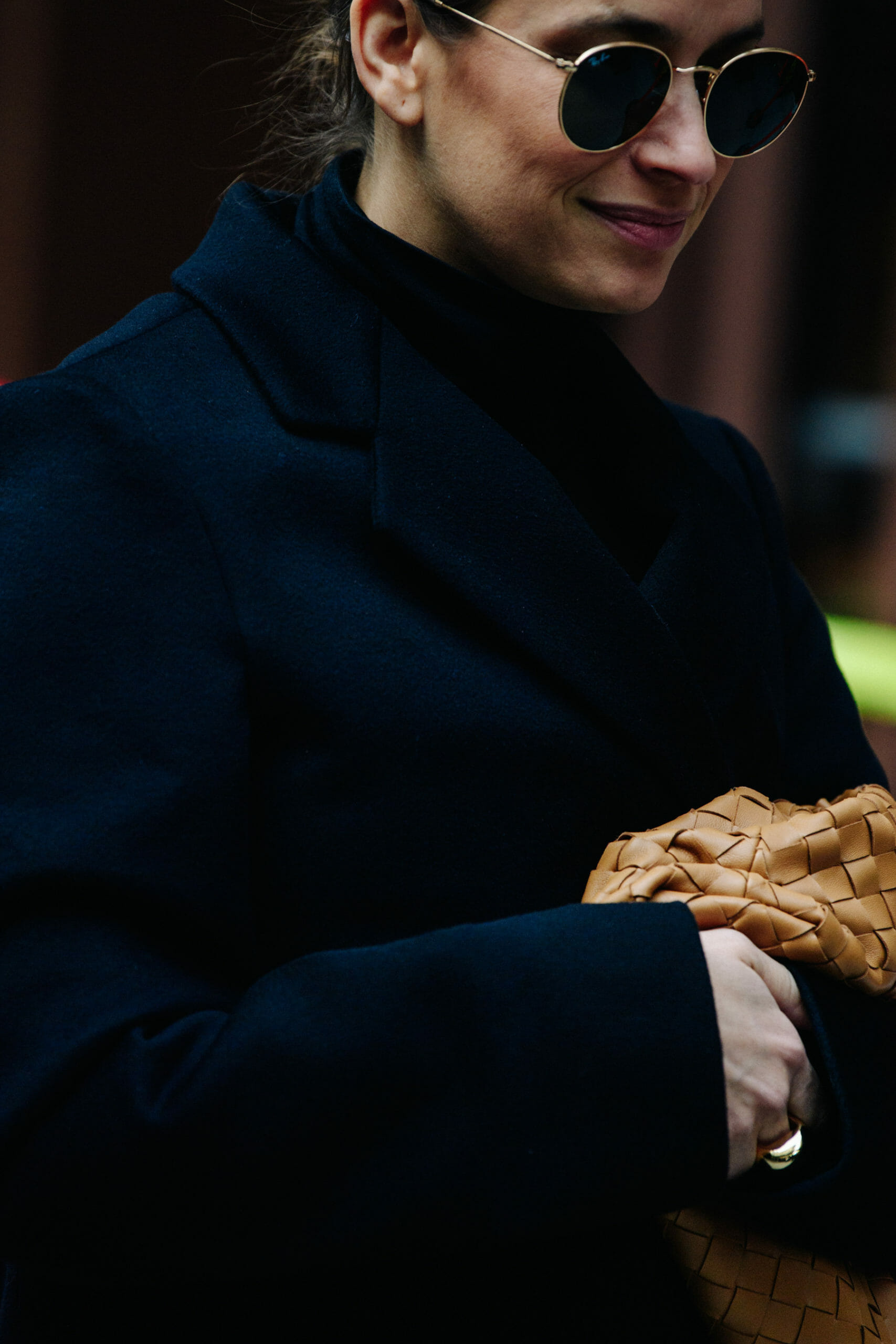 Woman wearing navy coat