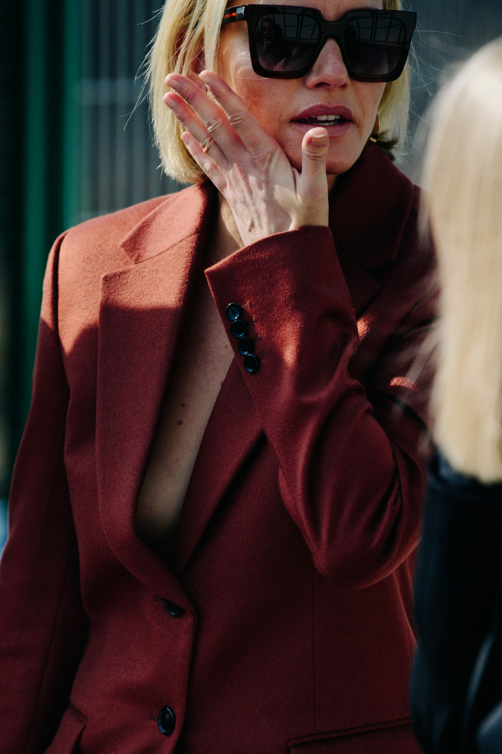 Woman wearing red blazer