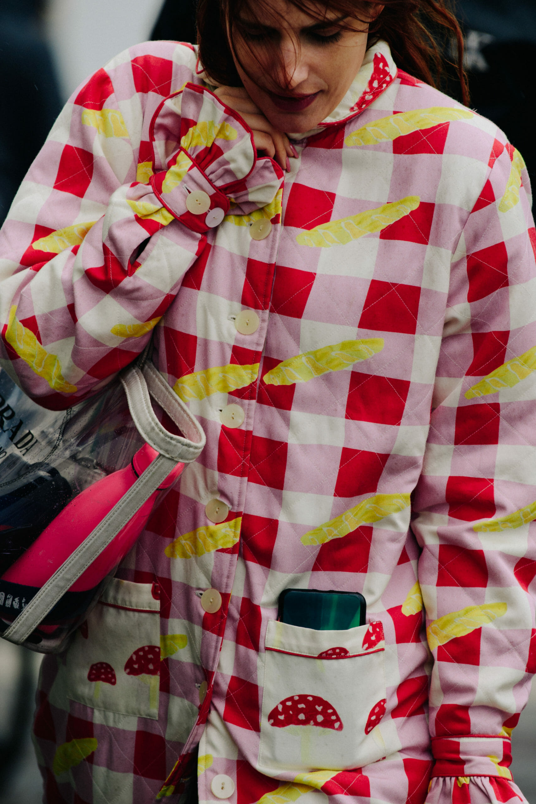 Woman wearing red check coat