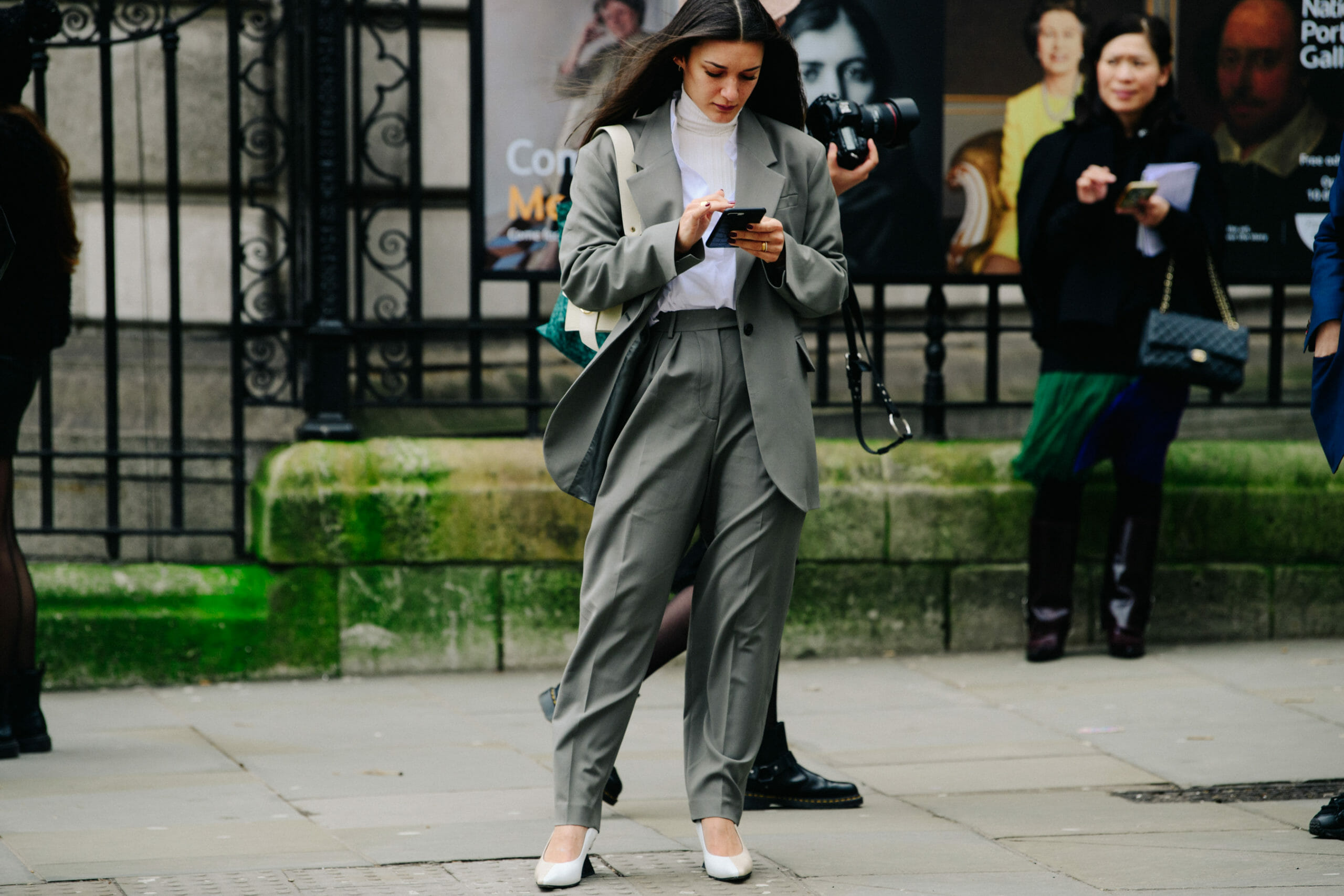 Woman wearing grey suit