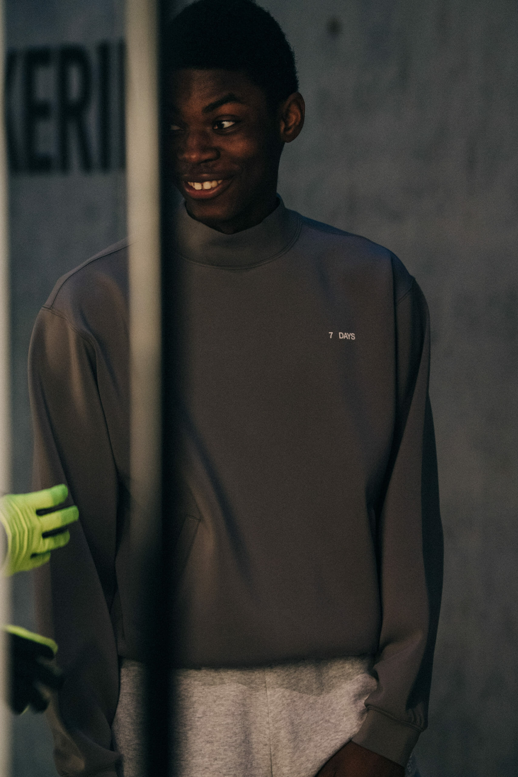 Model wearing grey 7 Days outfit