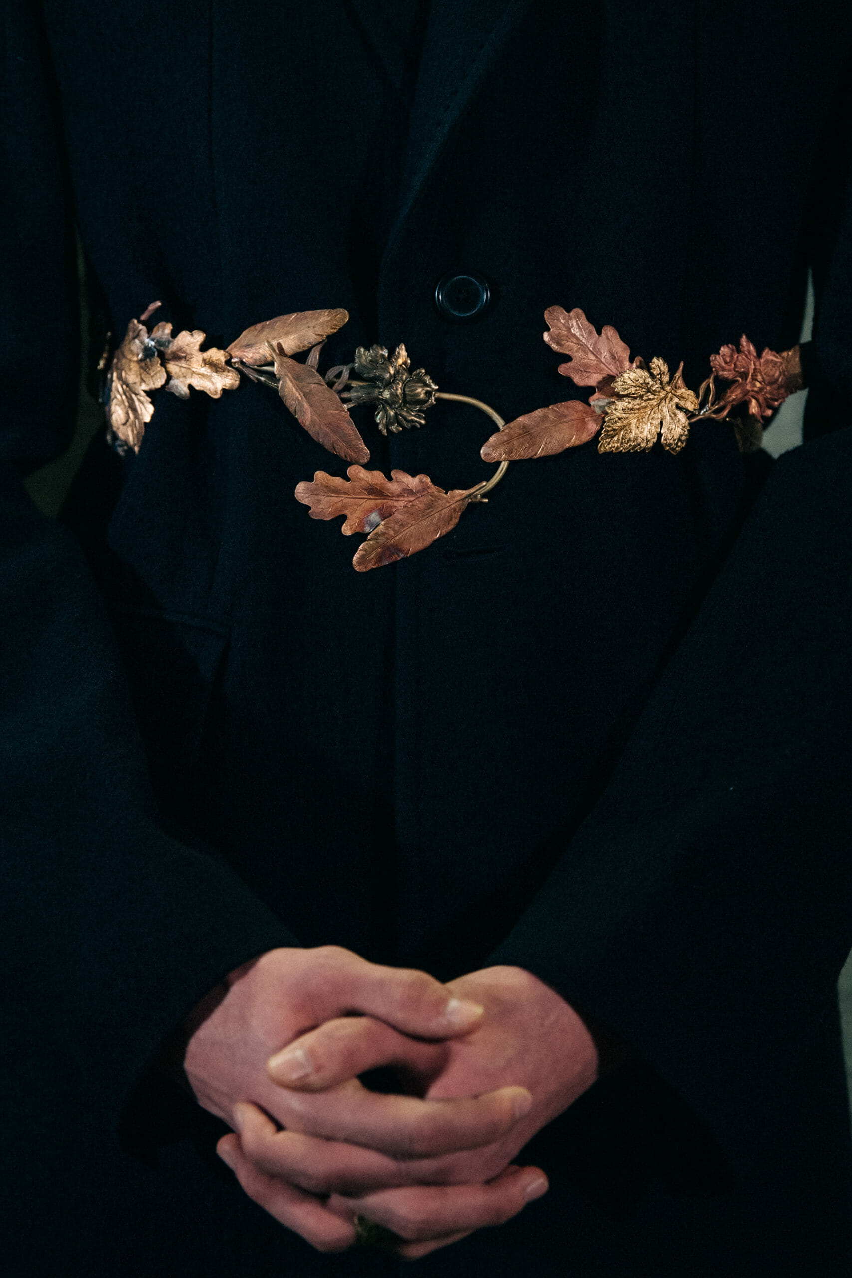 Models wearing gold leaves at Ann Demeulemeester