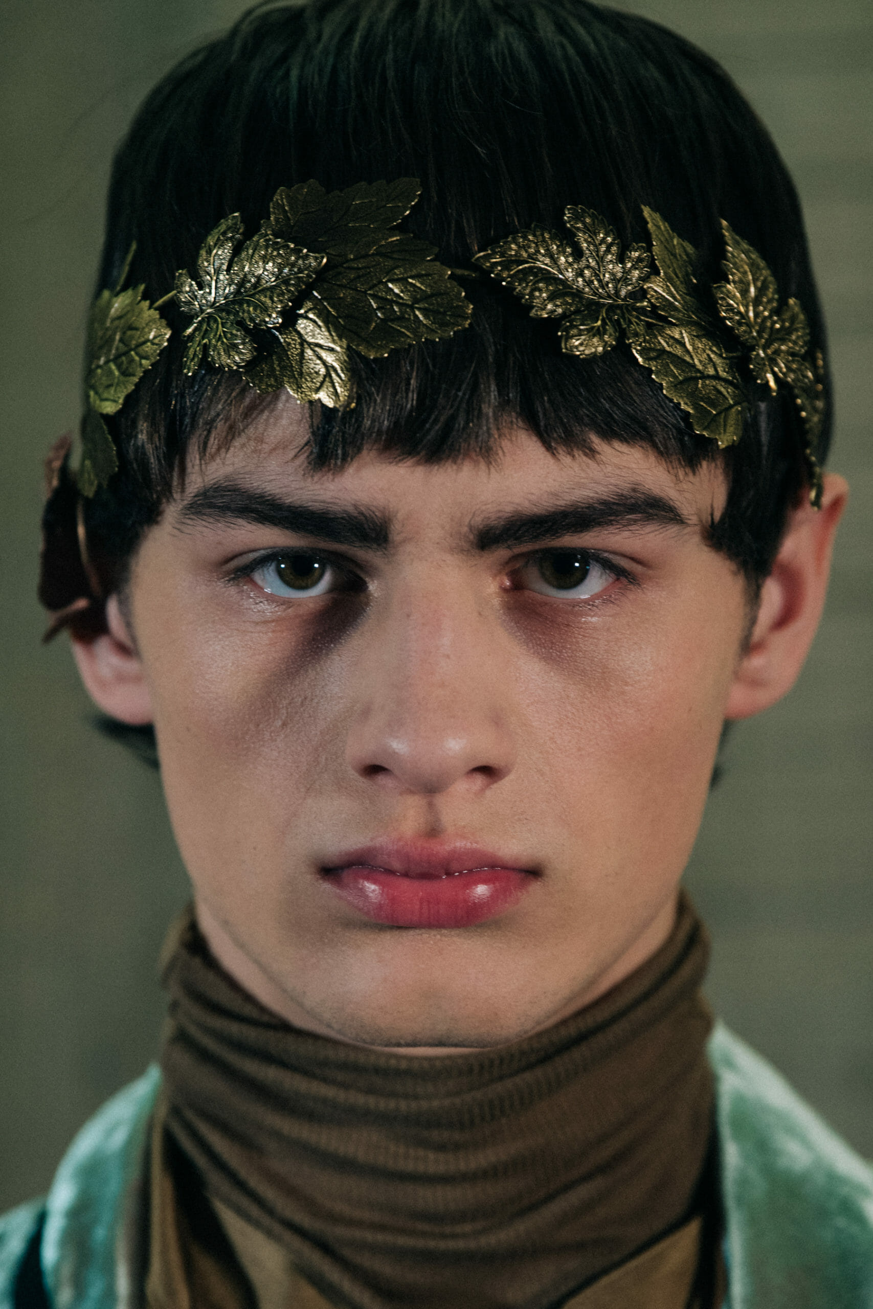 Models wearing gold leaves at Ann Demeulemeester