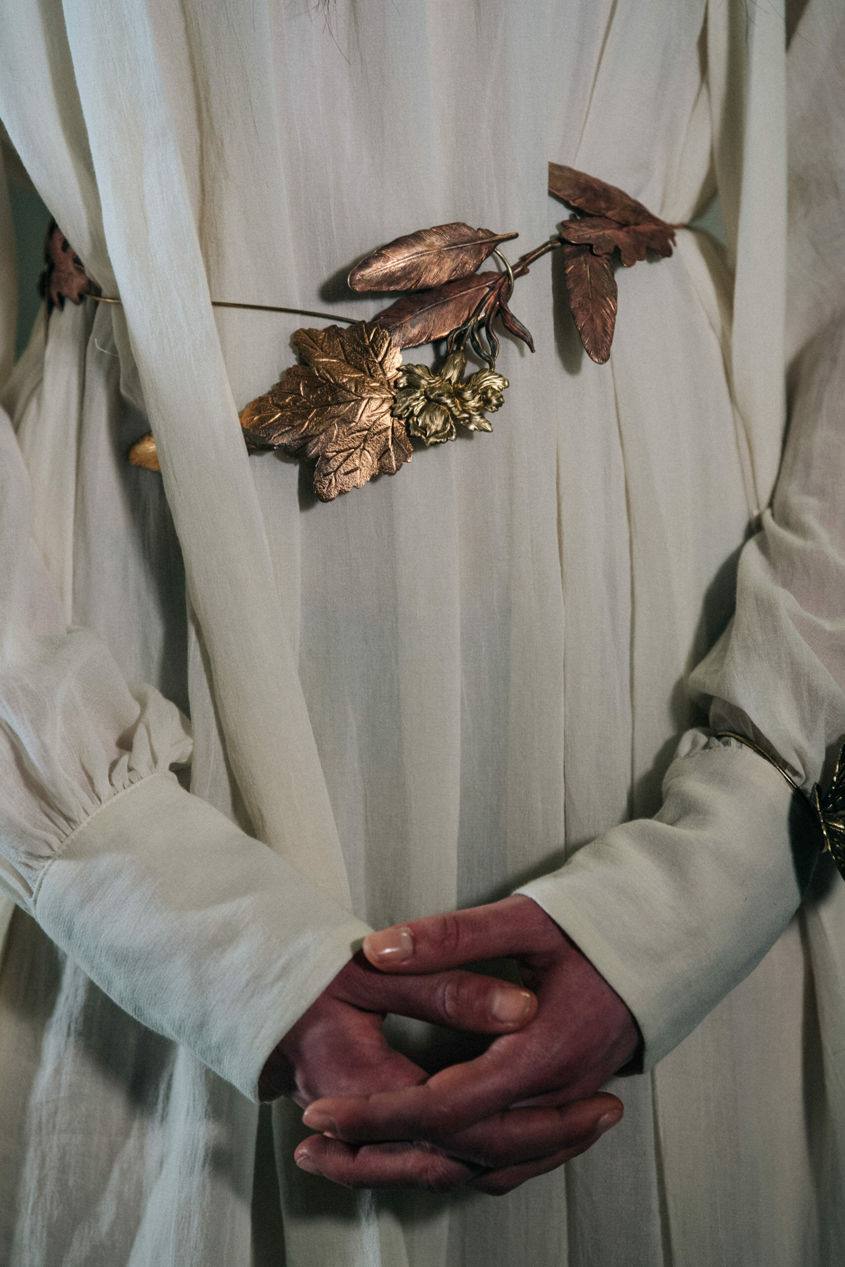 Model wearing gold leaves at Ann Demeulemeester