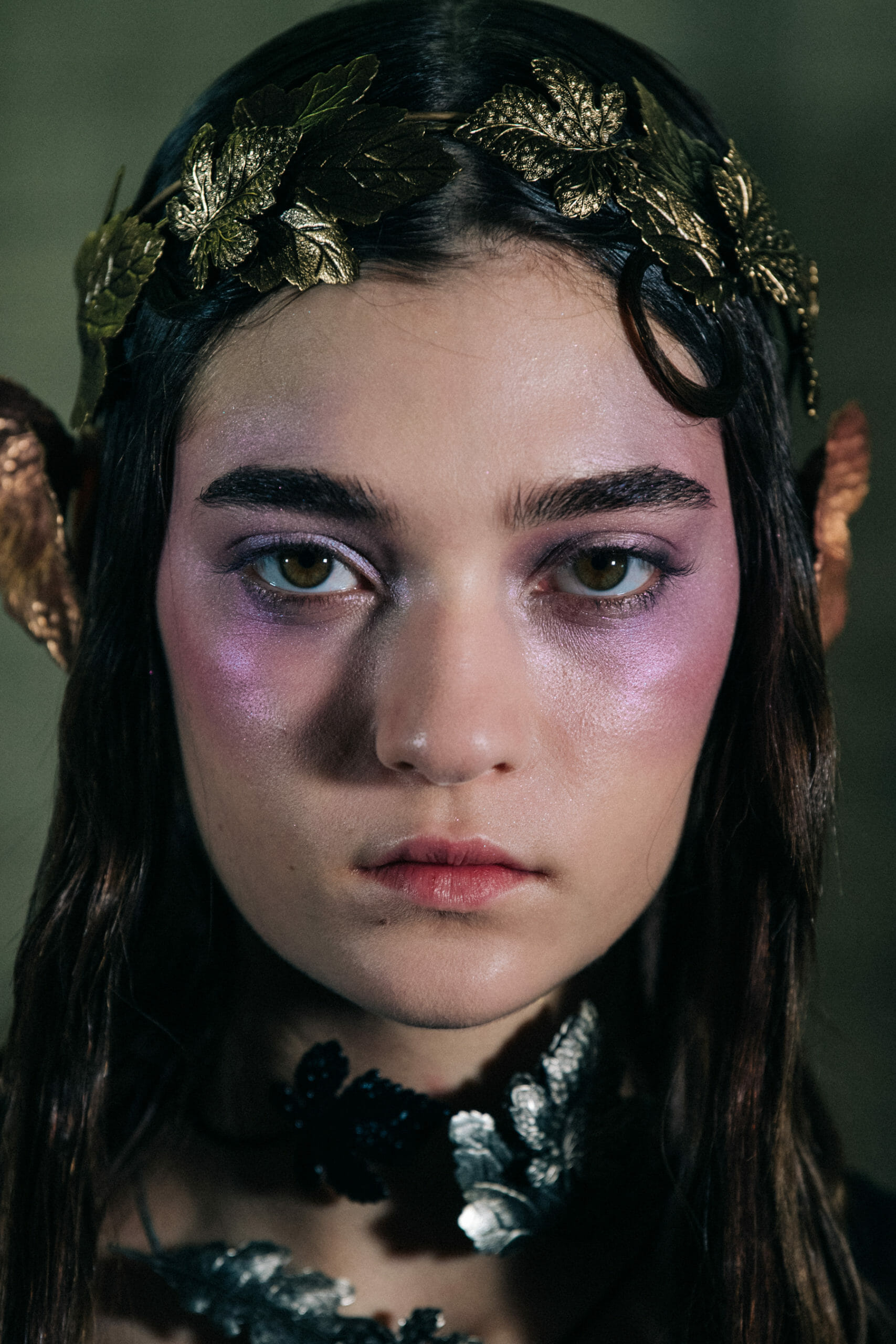 Model wearing gold leaves at Ann Demeulemeester