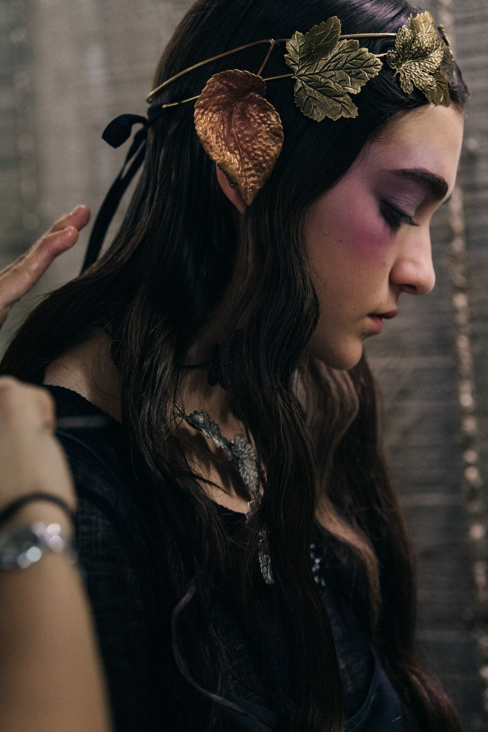 Model wearing gold leaves at Ann Demeulemeester