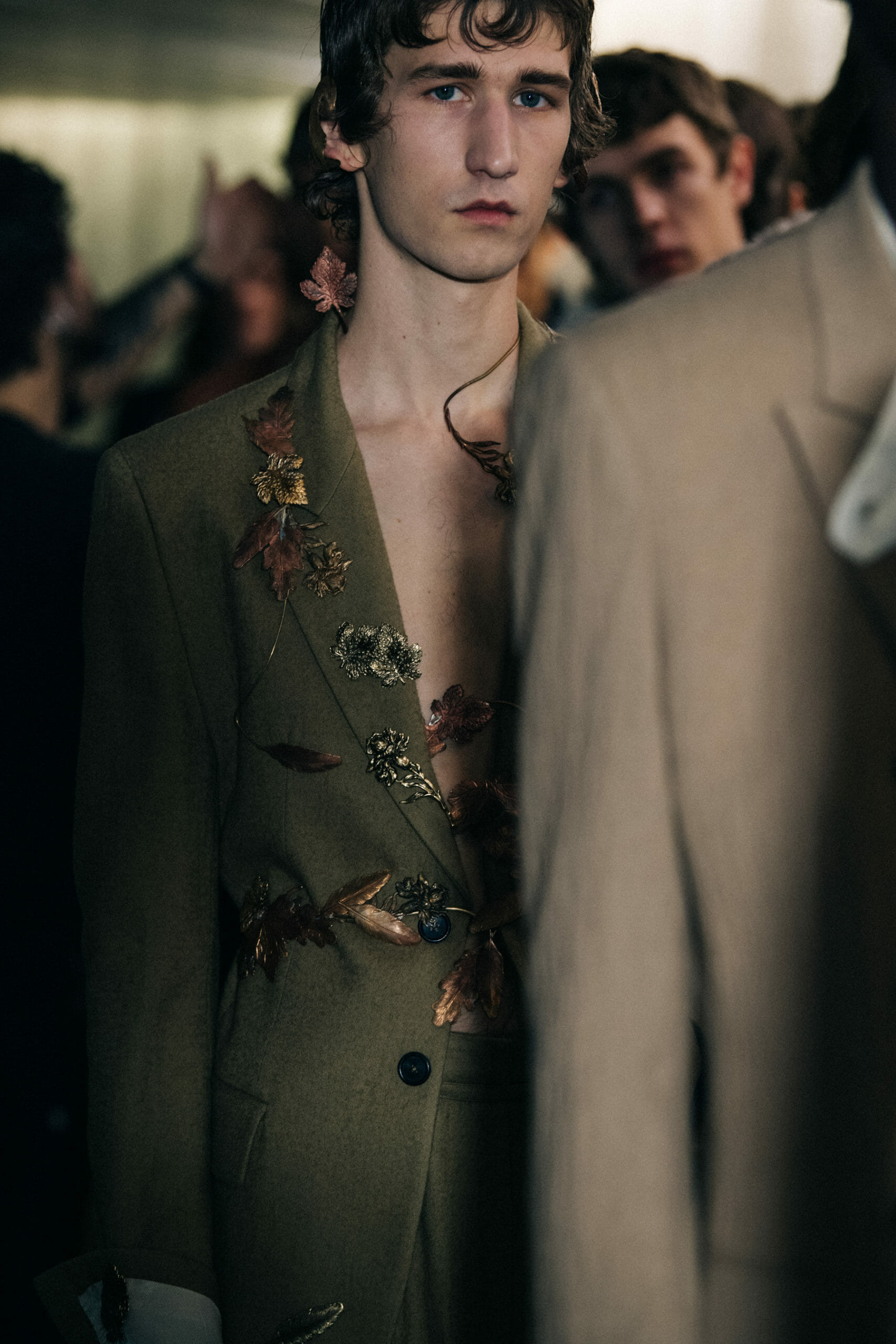 Model wearing green Ann Demeulemeester outfit