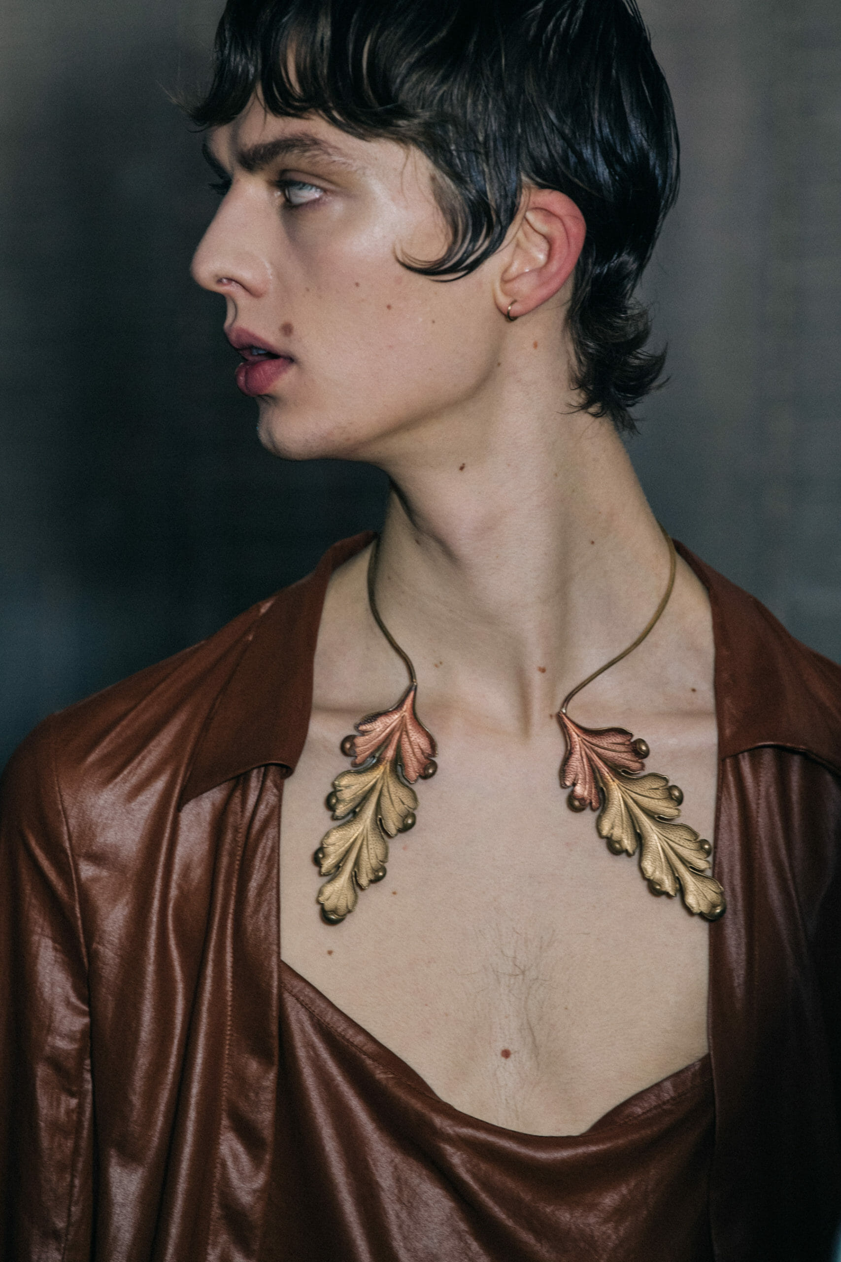 Model wearing brown Ann Demeulemeester outfit