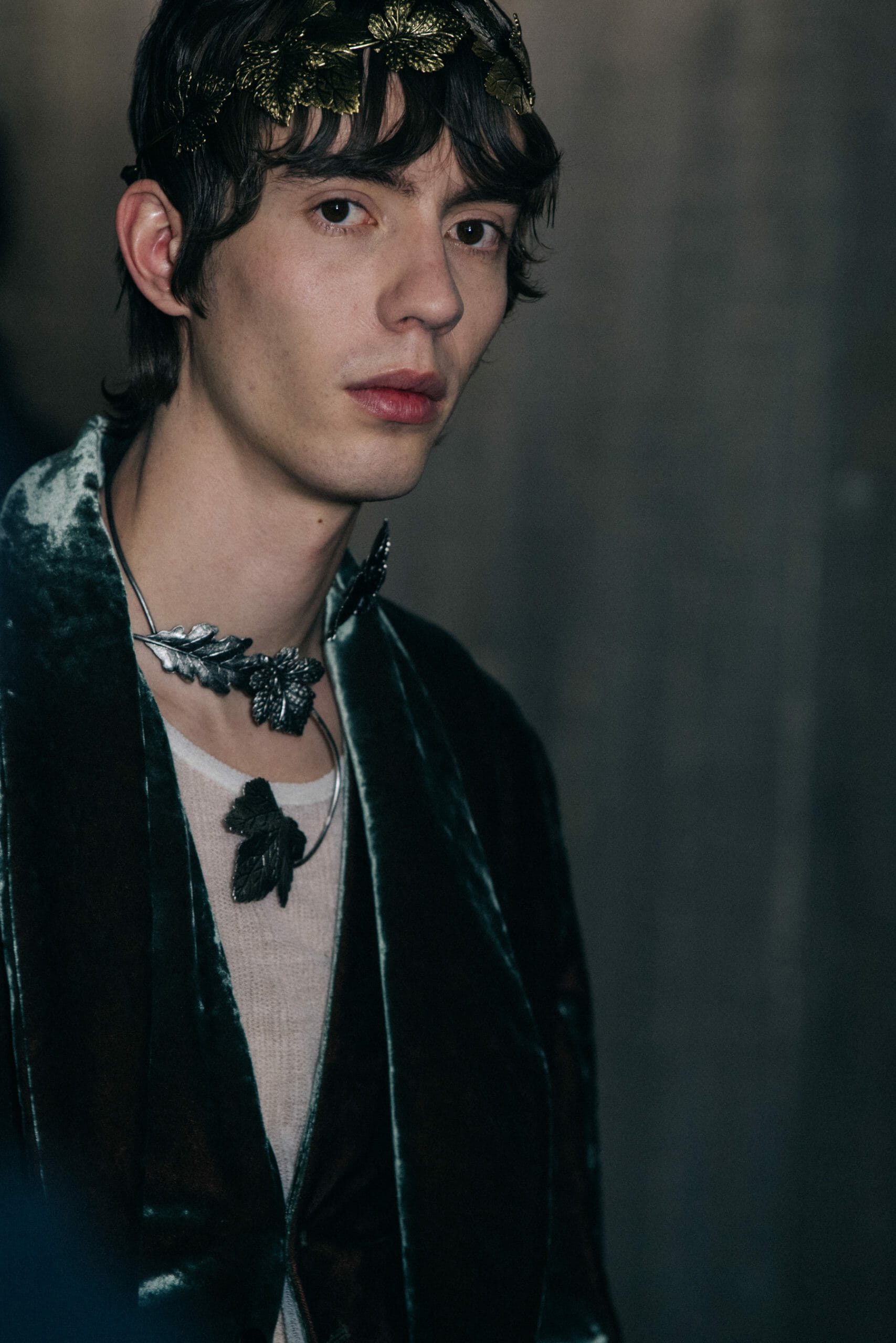 Model wearing green Ann Demeulemeester outfit
