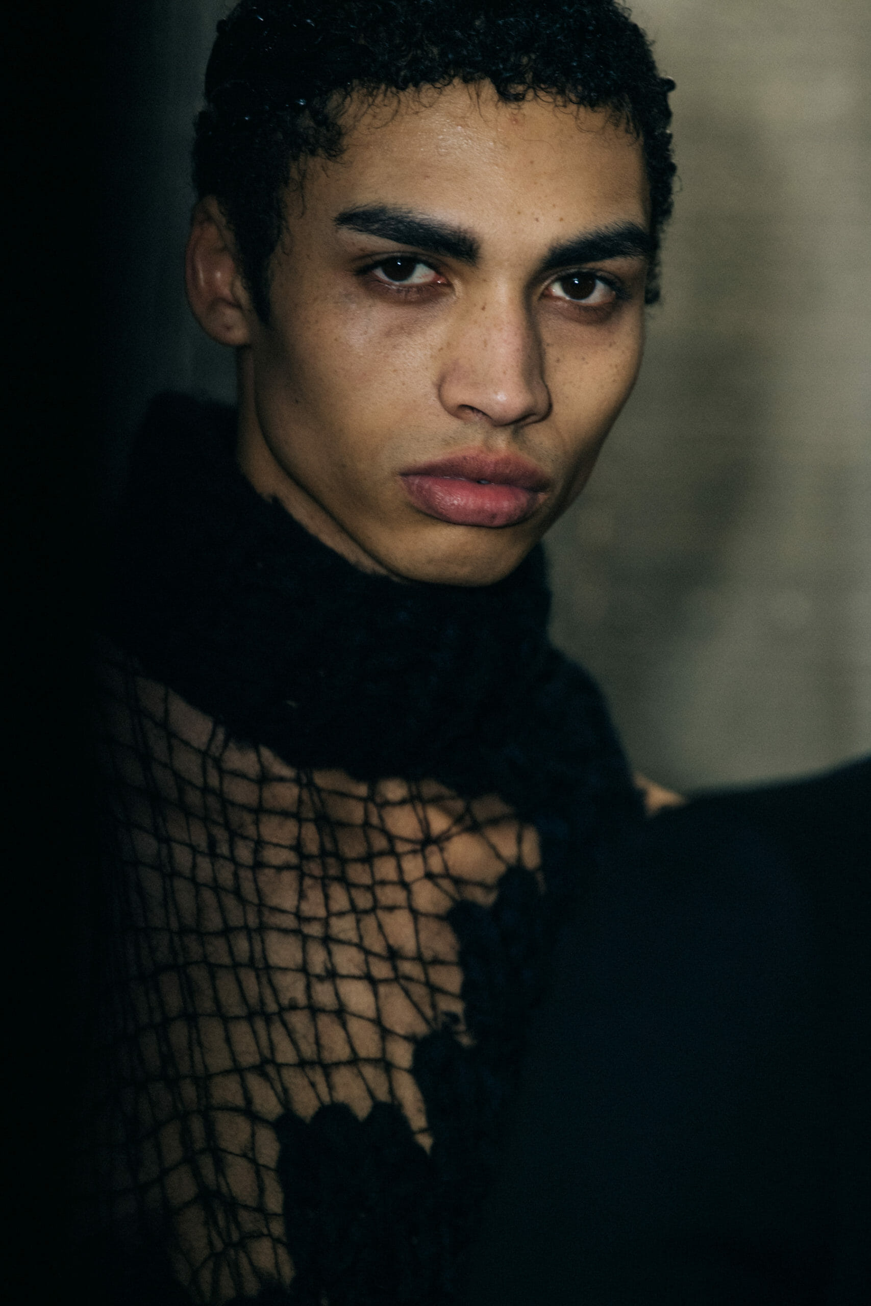 Model wearing black leaves at Ann Demeulemeester