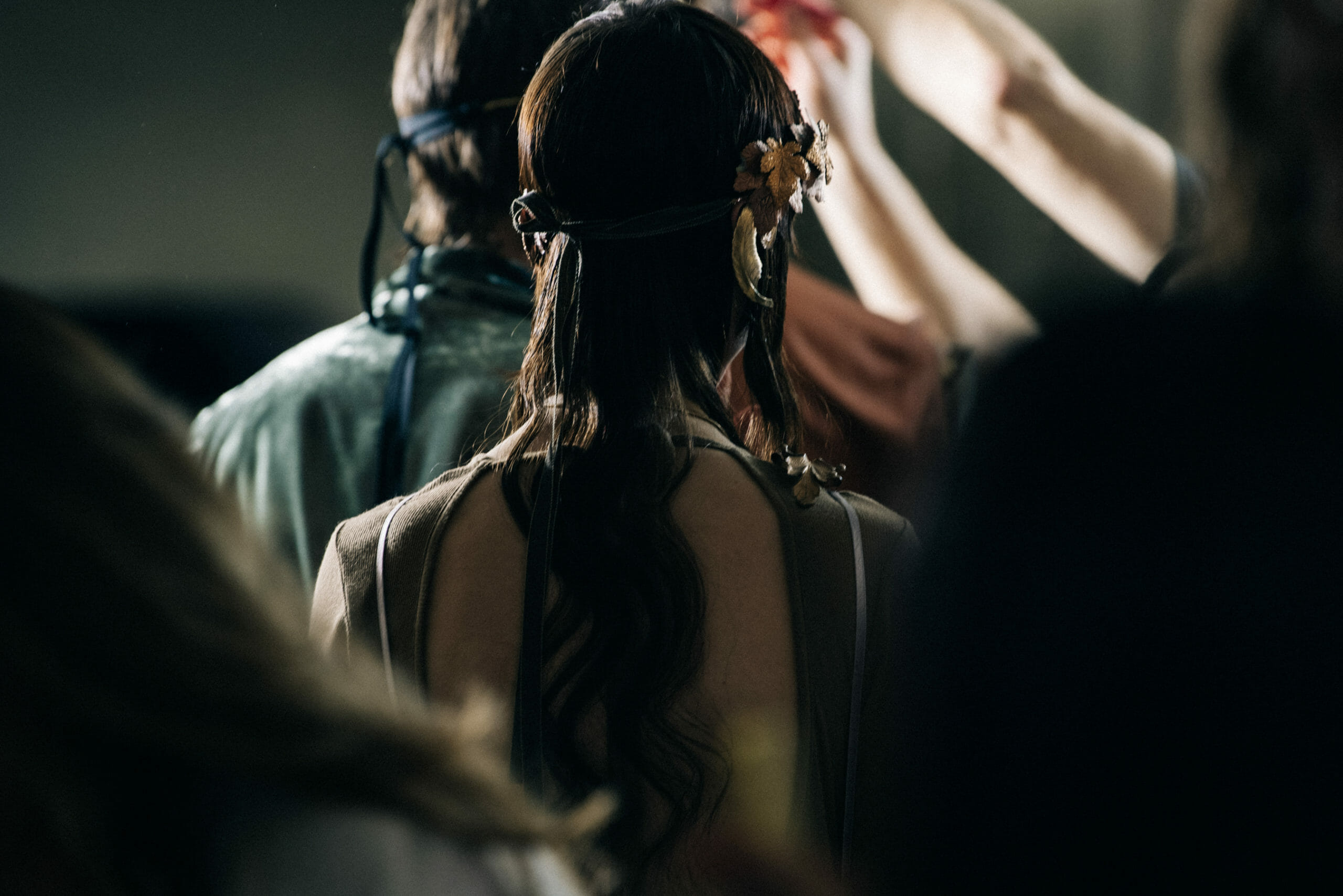 Models wearing gold leaves at Ann Demeulemeester