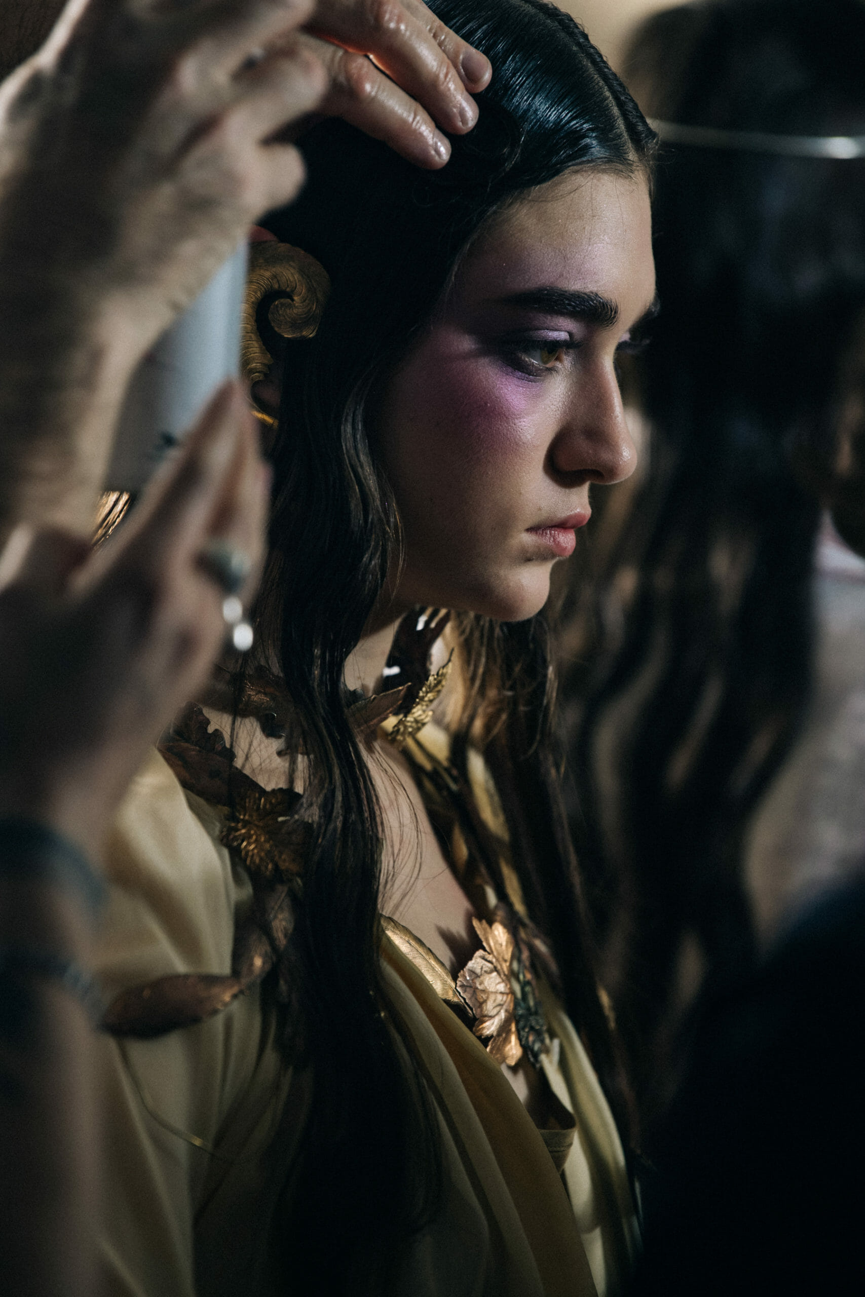 Model wearing gold leaves at Ann Demeulemeester