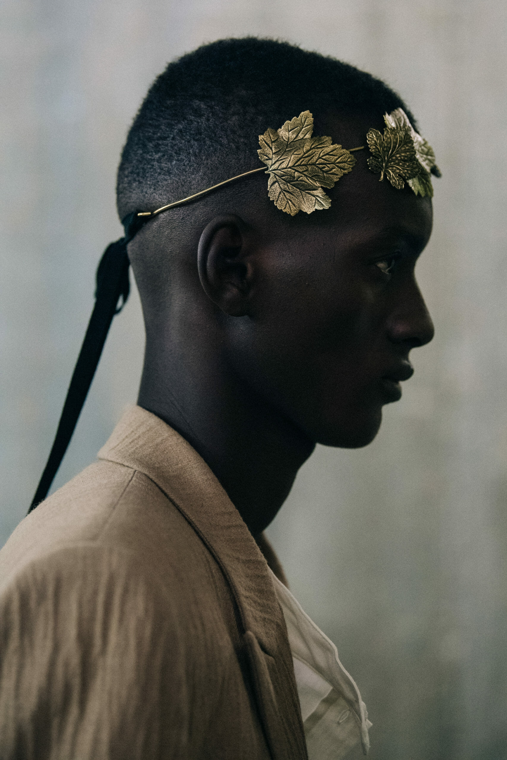 Models wearing gold leaves at Ann Demeulemeester