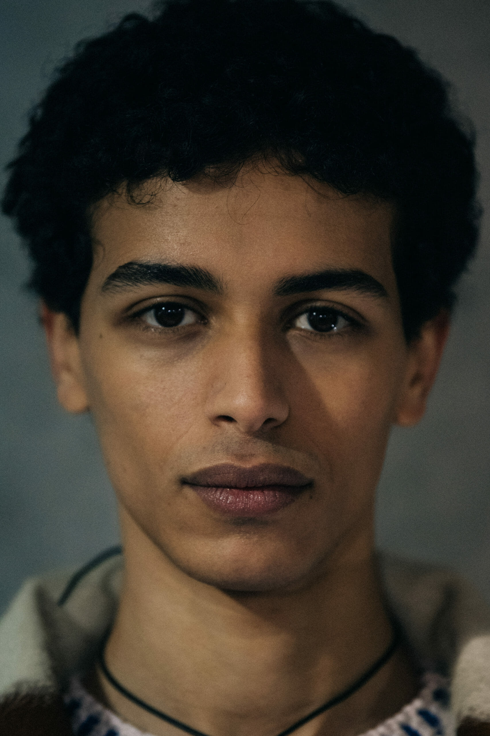 Model with short dark hair