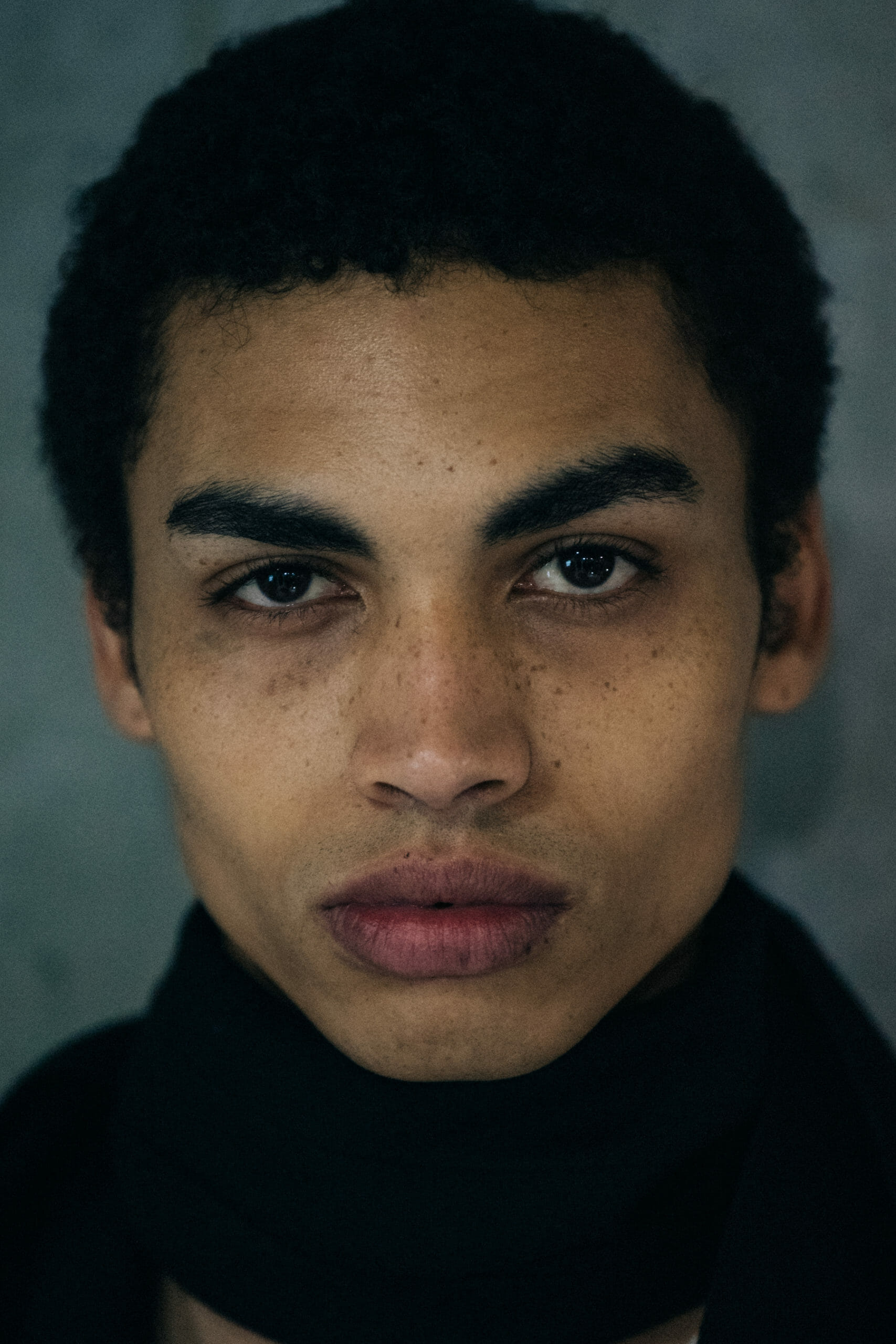 Model with short dark hair