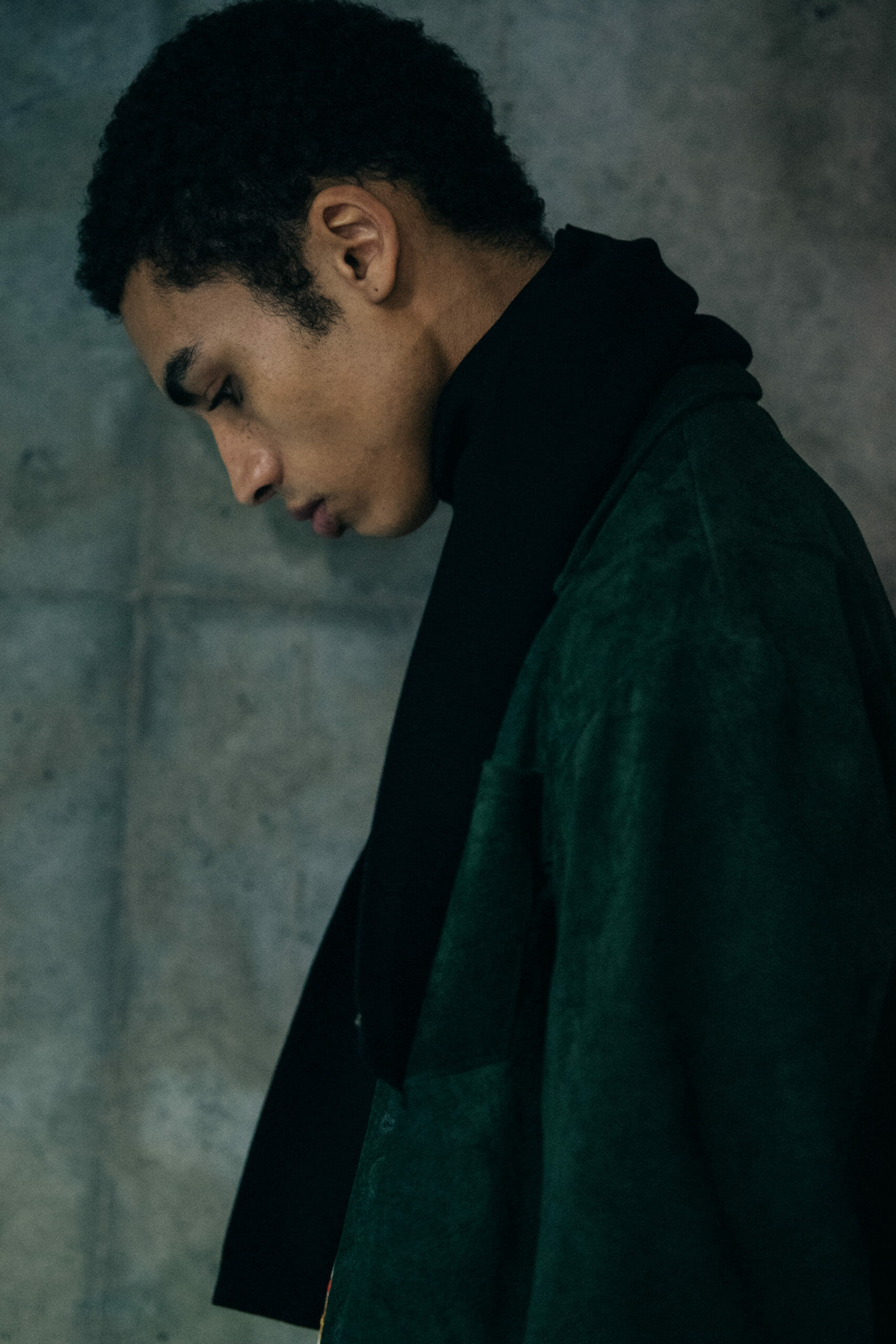 Model wearing green Bode coat