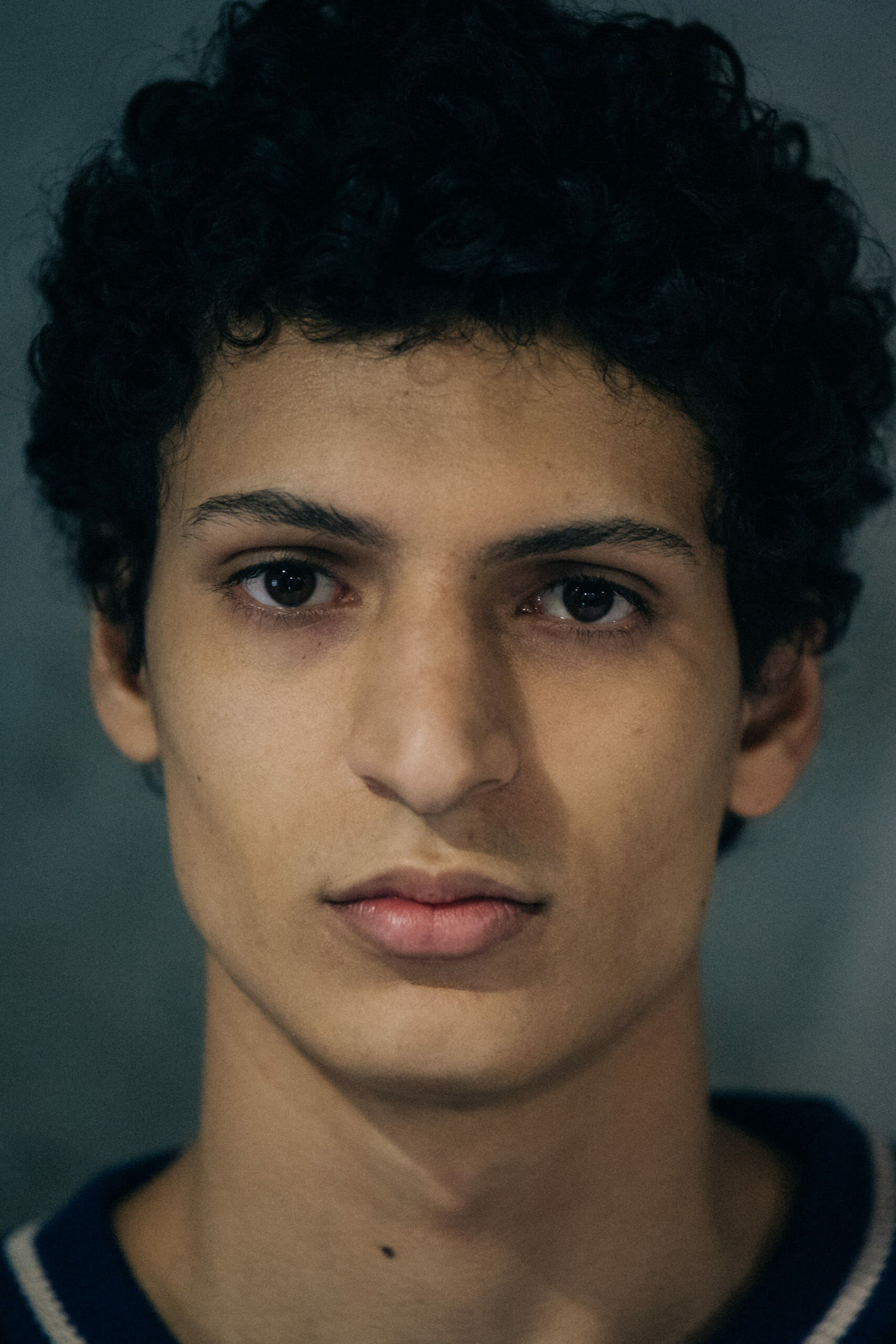 Model with messy dark hair