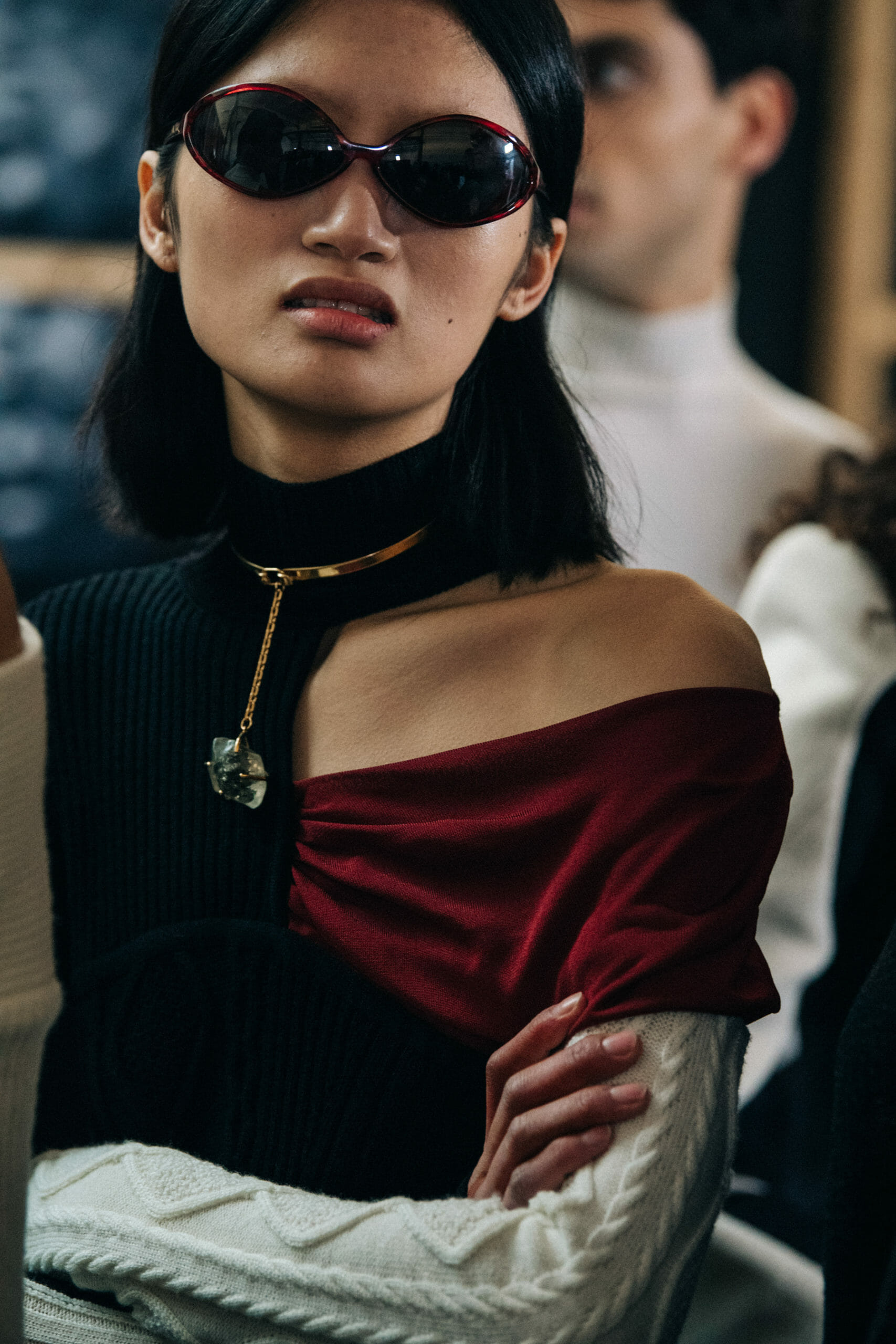 Model wearing black outfit at GmbH