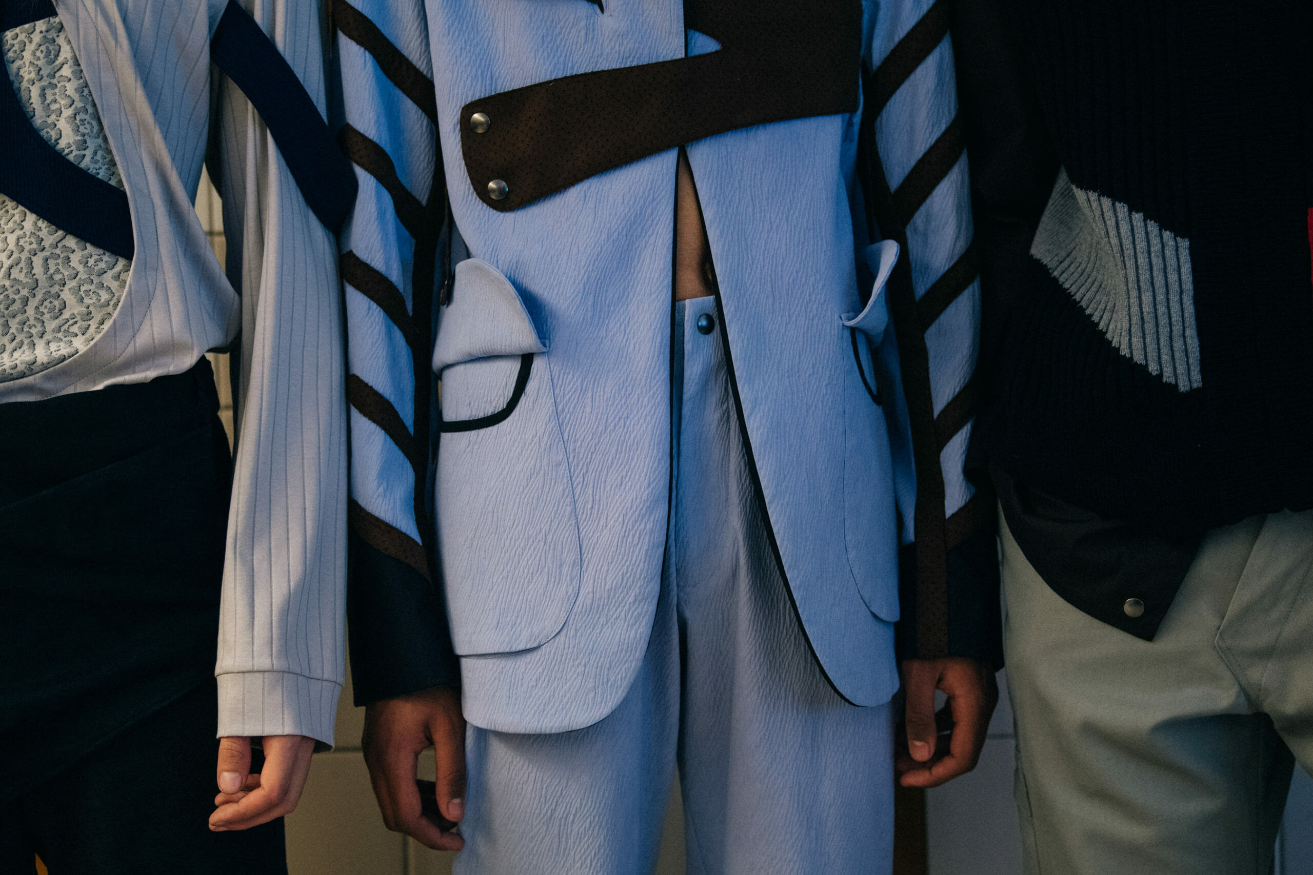 Models wearing blue Kiko Kostadinov outfits