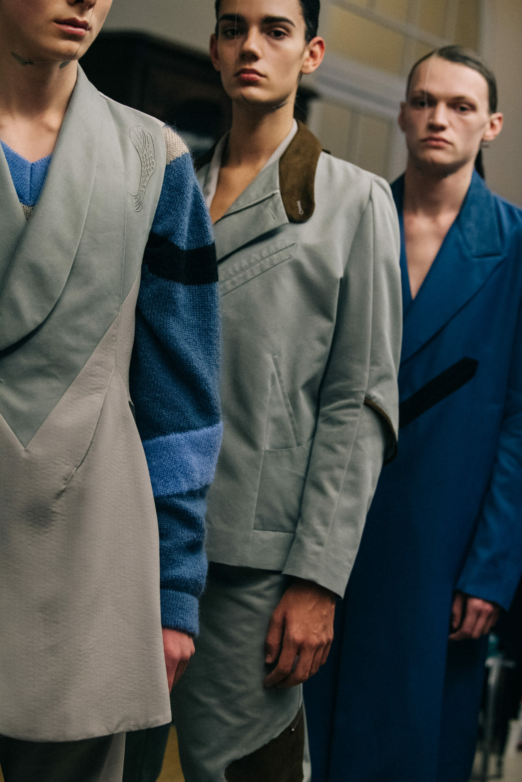 Models wearing blue Kiko Kostadinov outfits