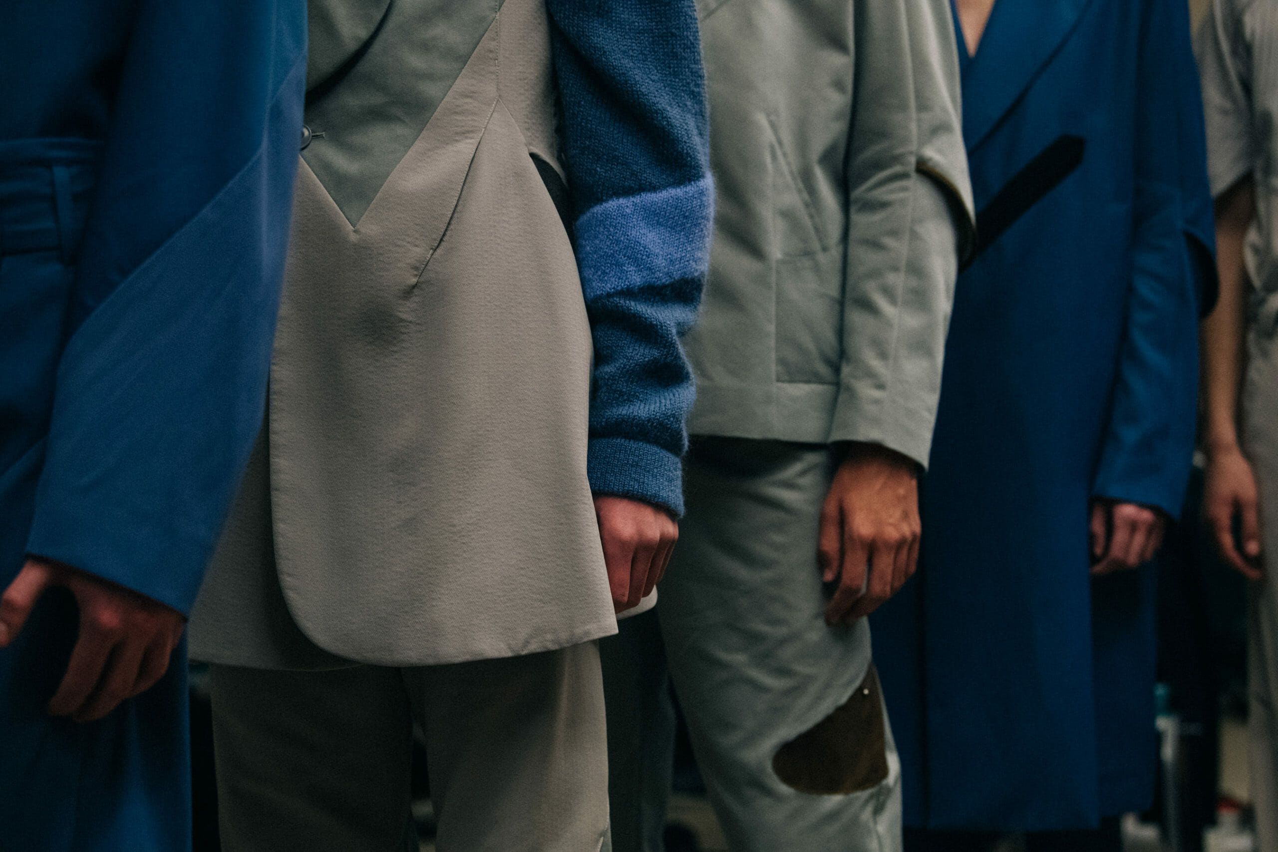 Models wearing blue Kiko Kostadinov outfits