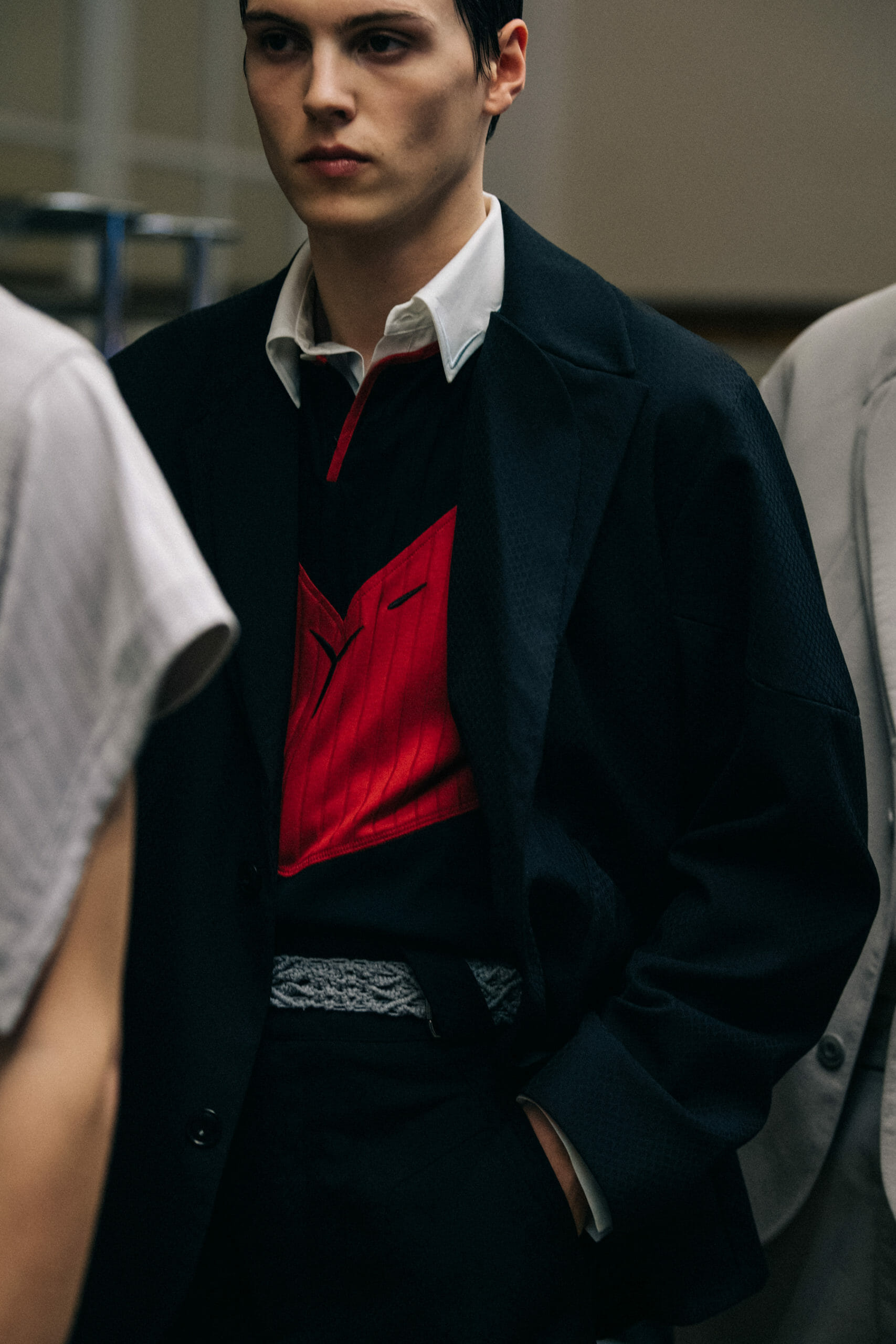 Models wearing red Kiko Kostadinov outfits