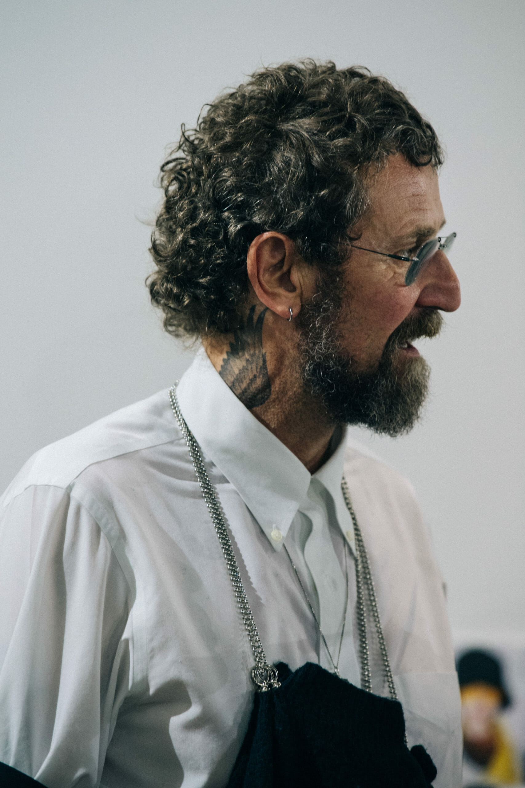 Designer wearing white shirt