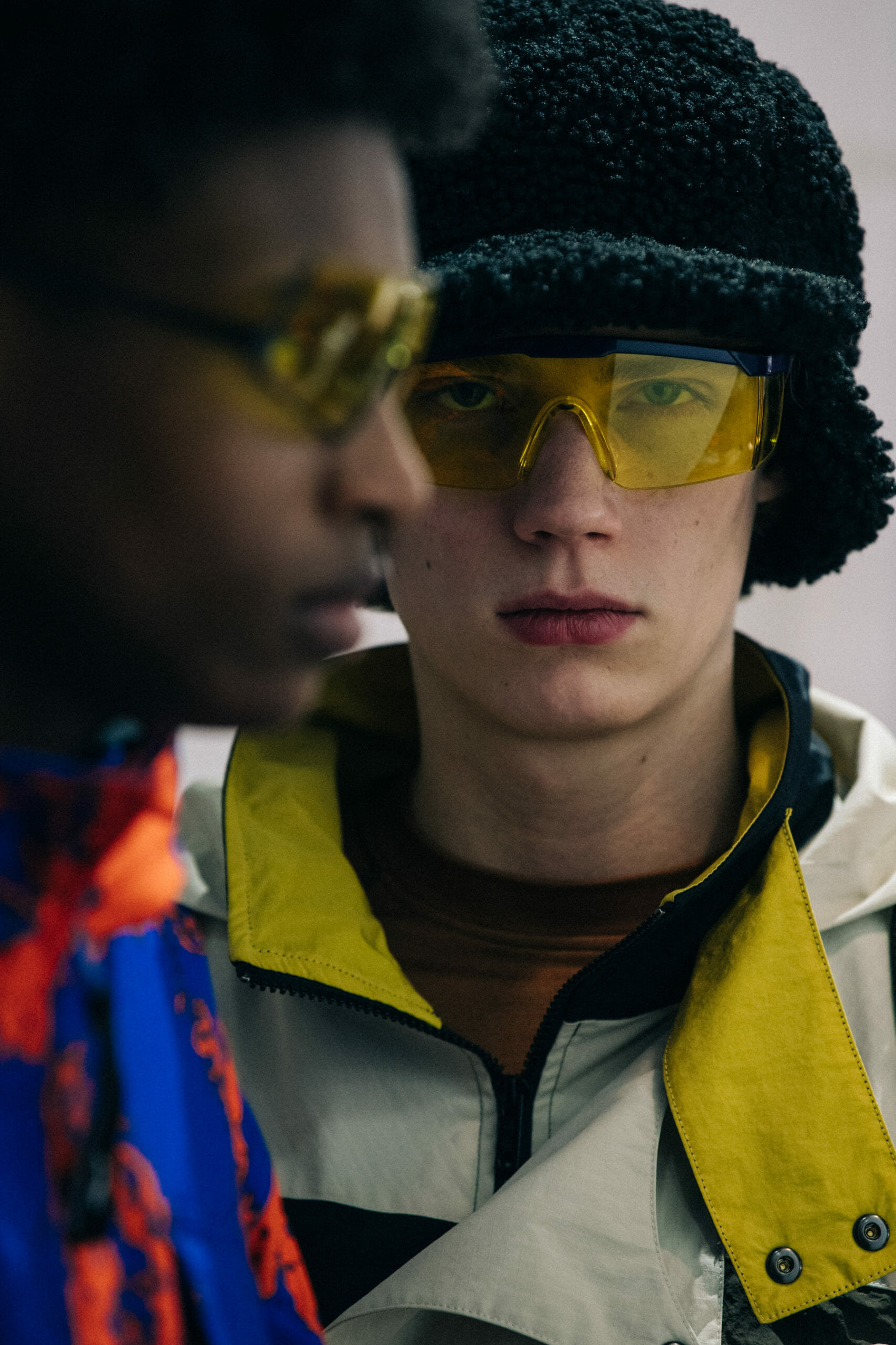Models wearing coloured glasses at Li Ning