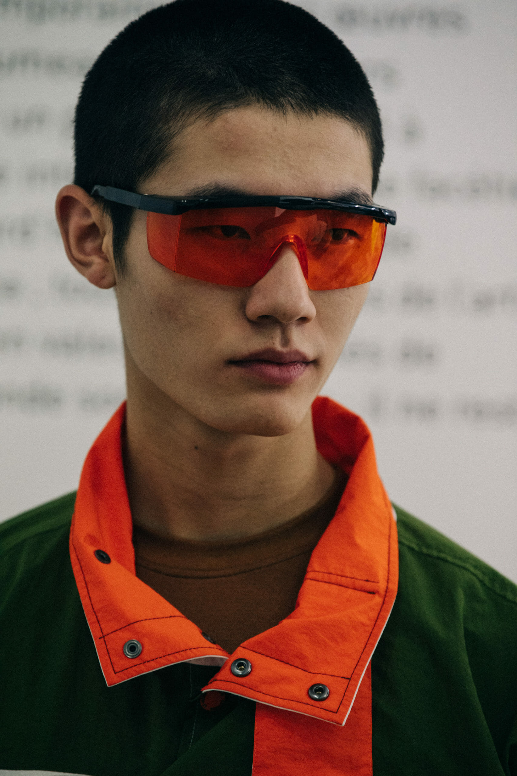 Models wearing coloured glasses at Li Ning