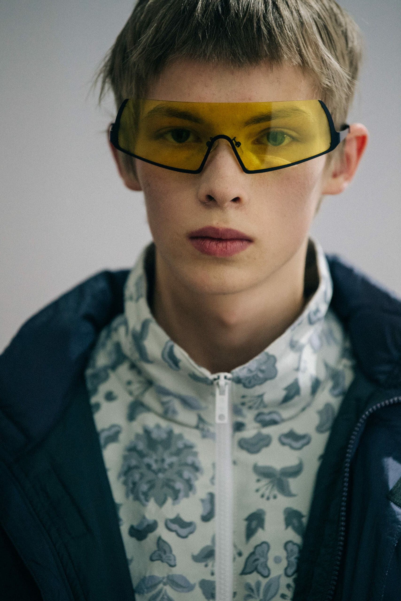 Models wearing coloured glasses at Li Ning