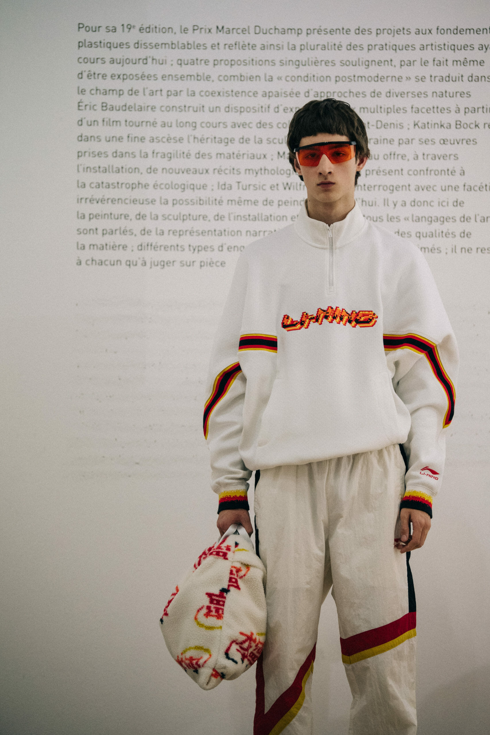 Models wearing coloured glasses at Li Ning
