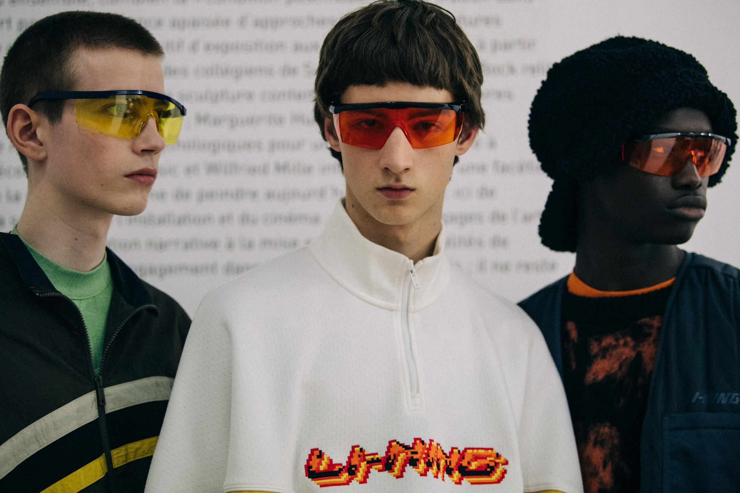 Models wearing coloured glasses at Li Ning