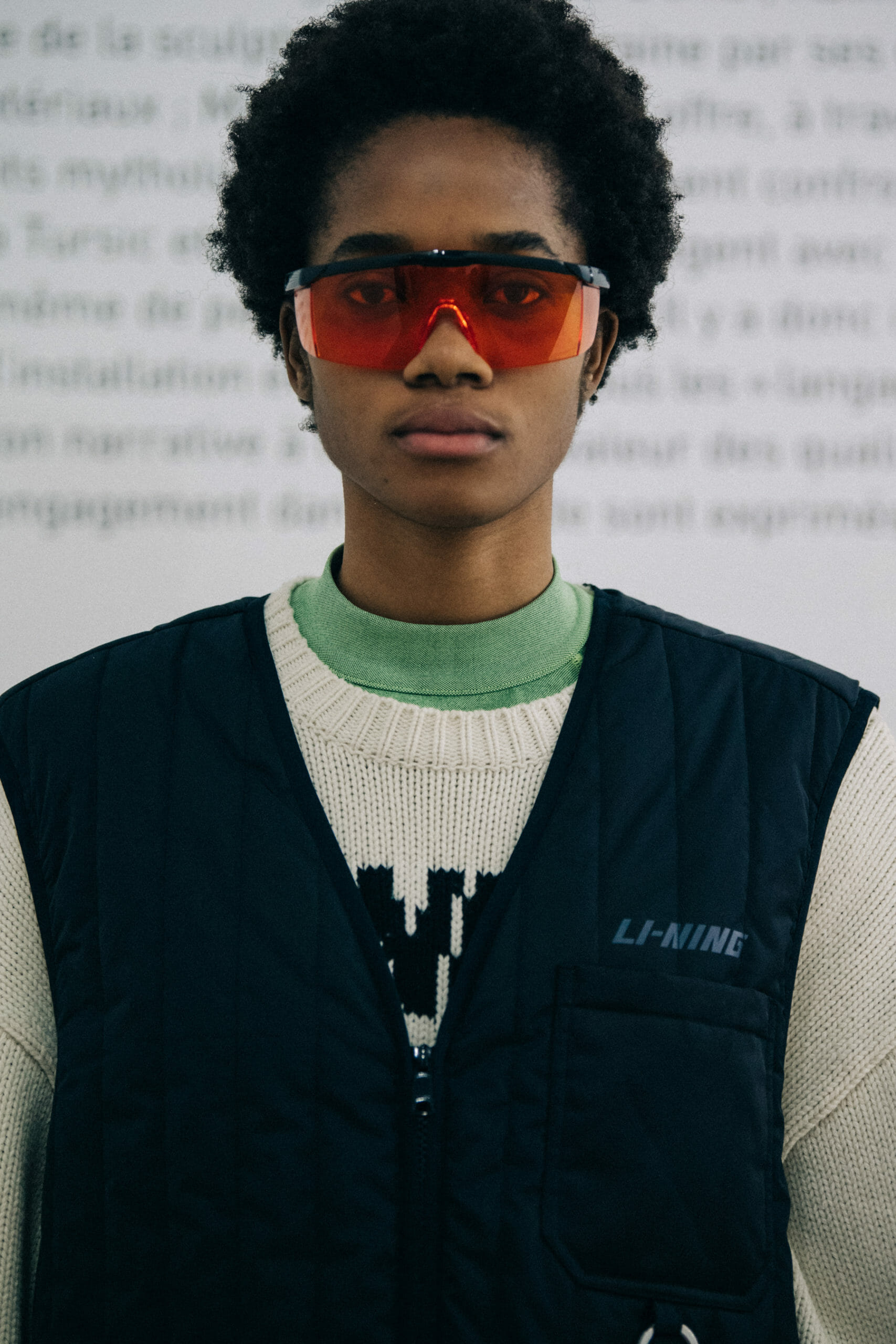 Models wearing coloured glasses at Li Ning