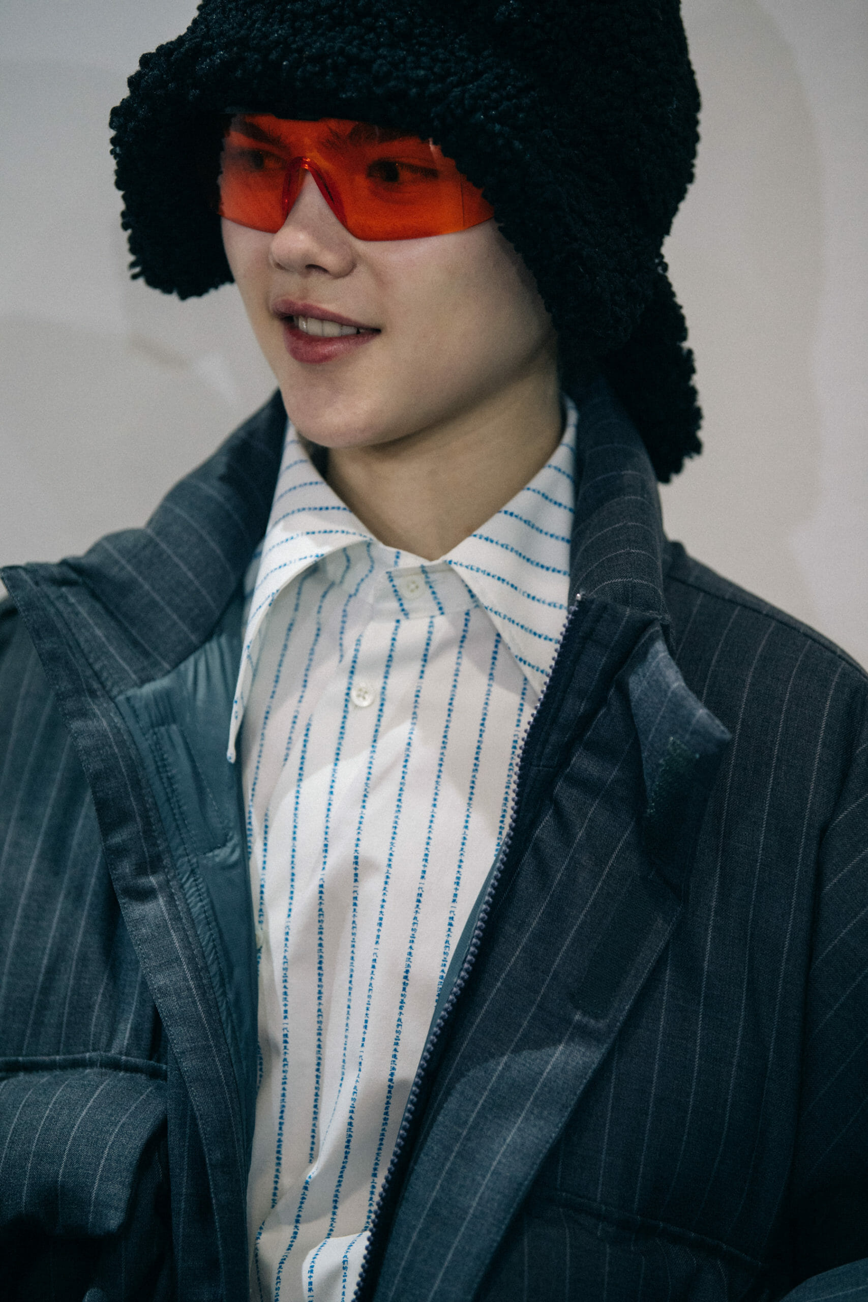 Models wearing coloured glasses at Li Ning