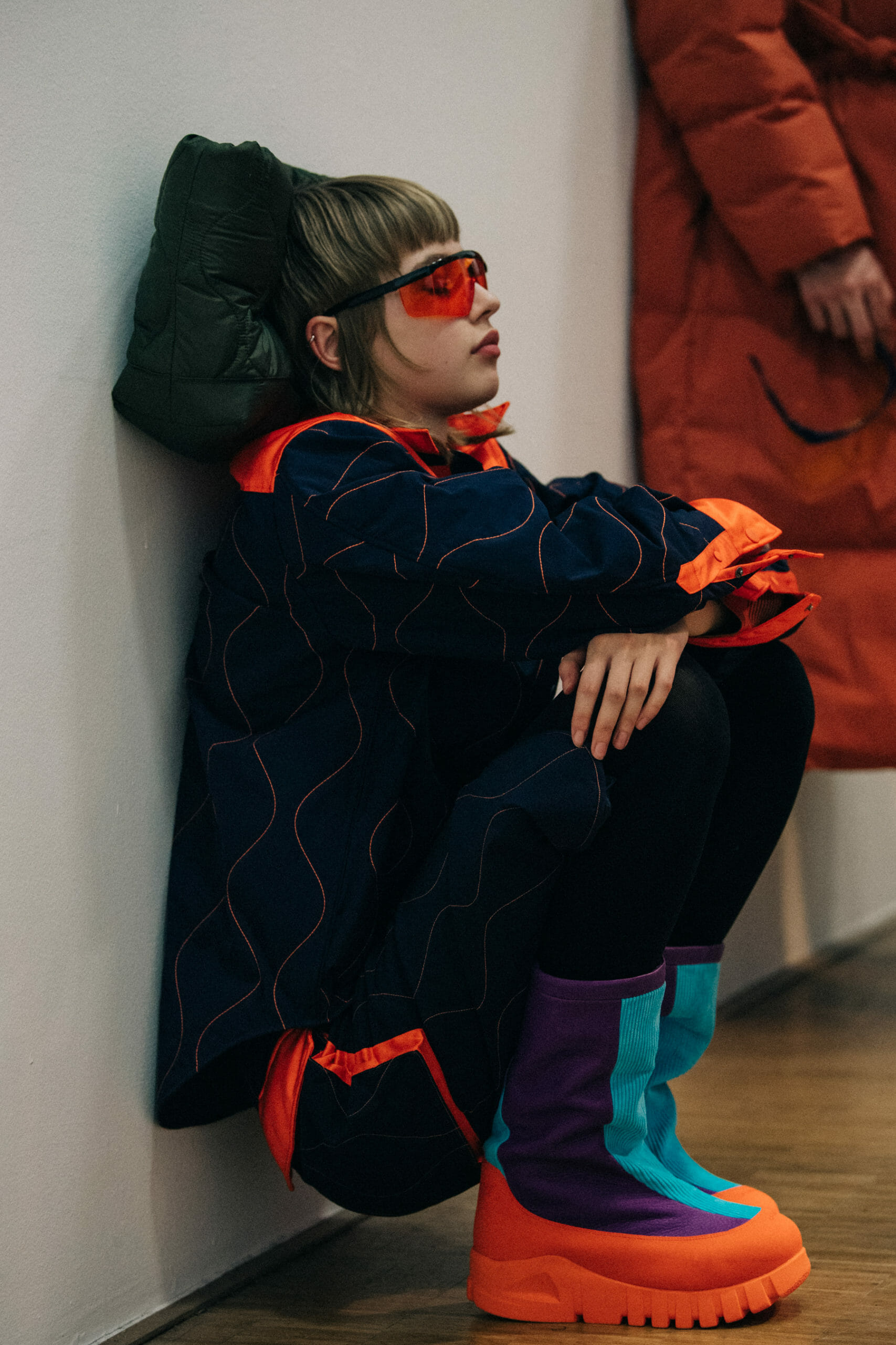 Models wearing coloured glasses at Li Ning